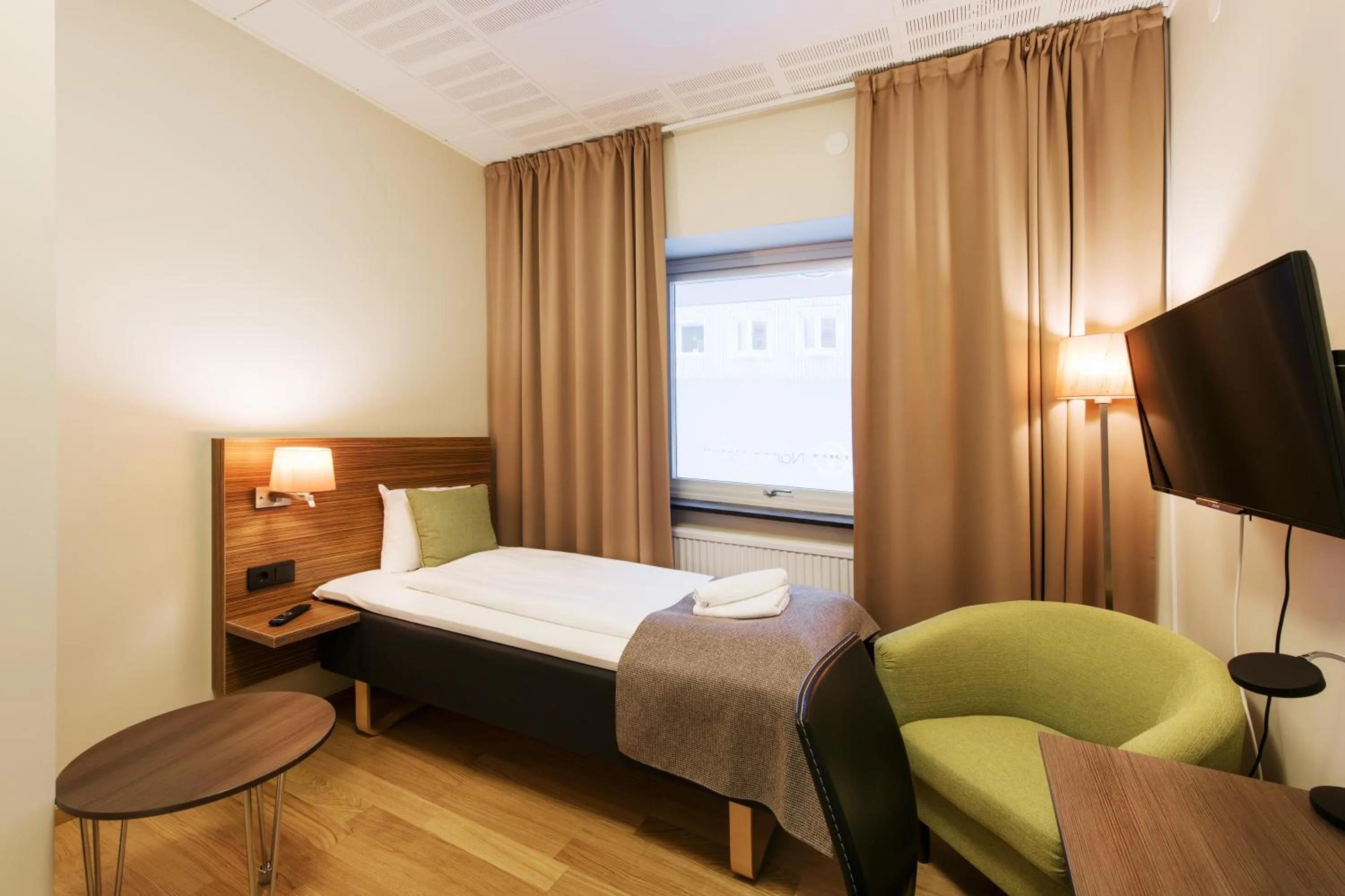 Bed in Hotell Amber & Naran