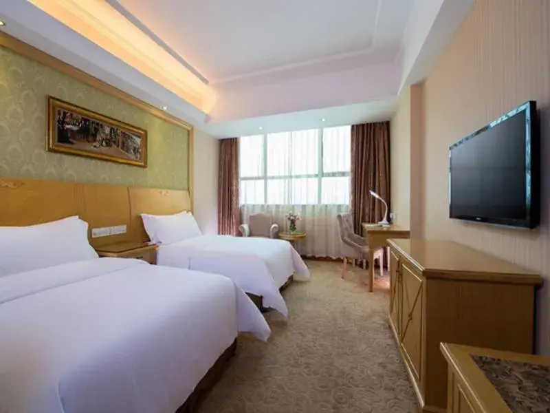 Bed in Vienna Hotel Longchuan Bed in Vienna Hotel Longchuan