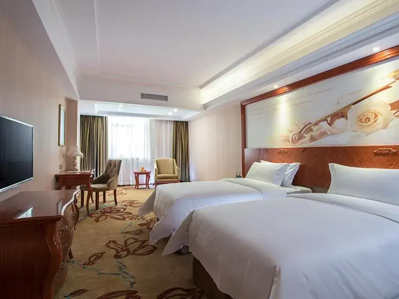 Bed in Vienna Hotel Longchuan Bed in Vienna Hotel Longchuan