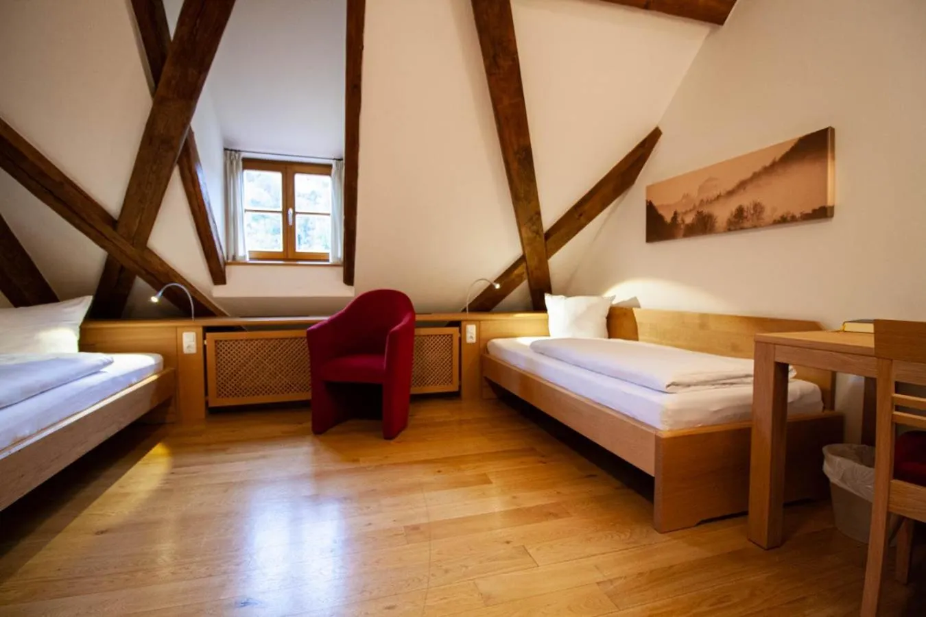 Bed in Gästehaus St. Georg - Weltenburger Klosterbetriebe GmbH