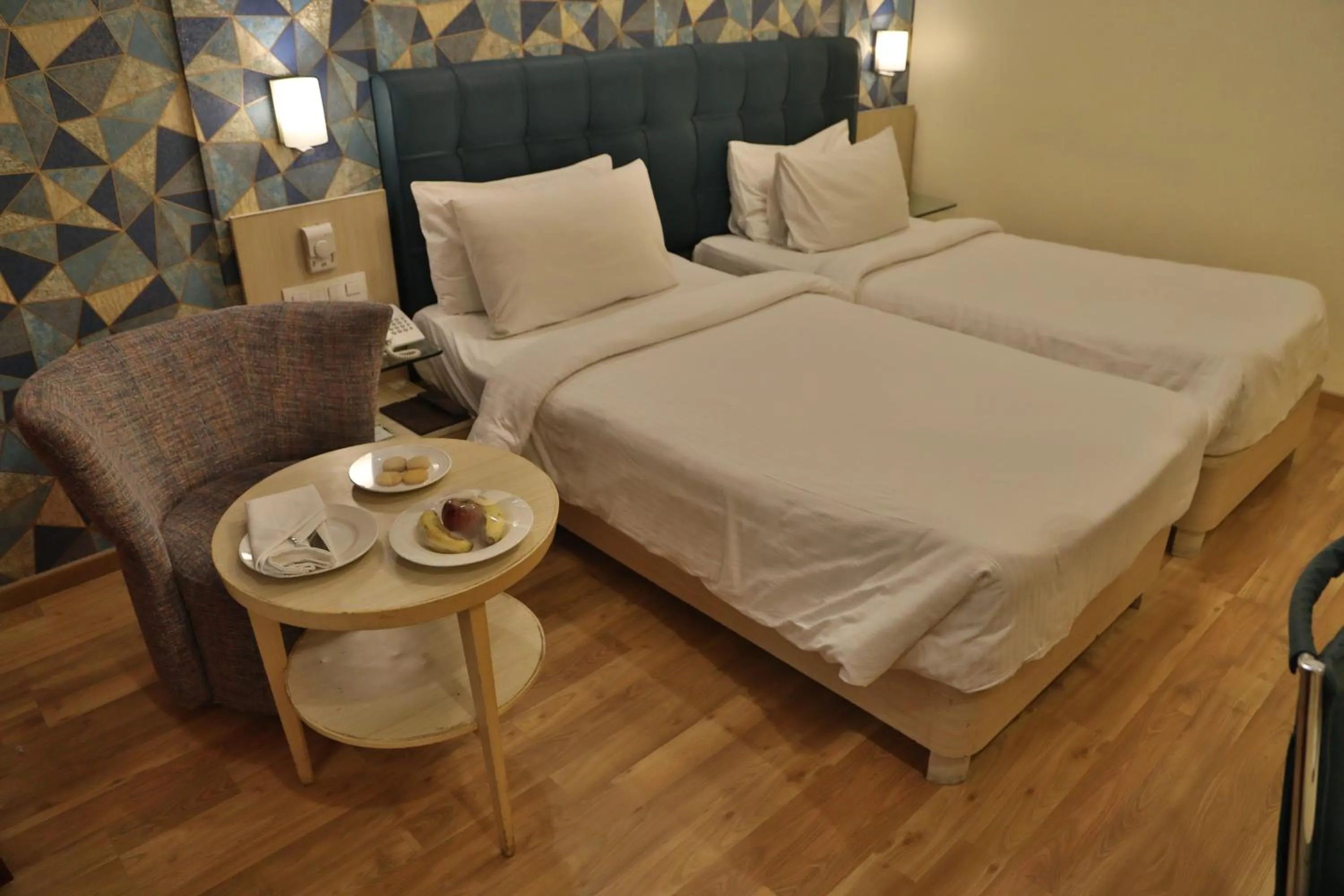 Bedroom, Bed in Sarovar Portico Naraina, Hotel