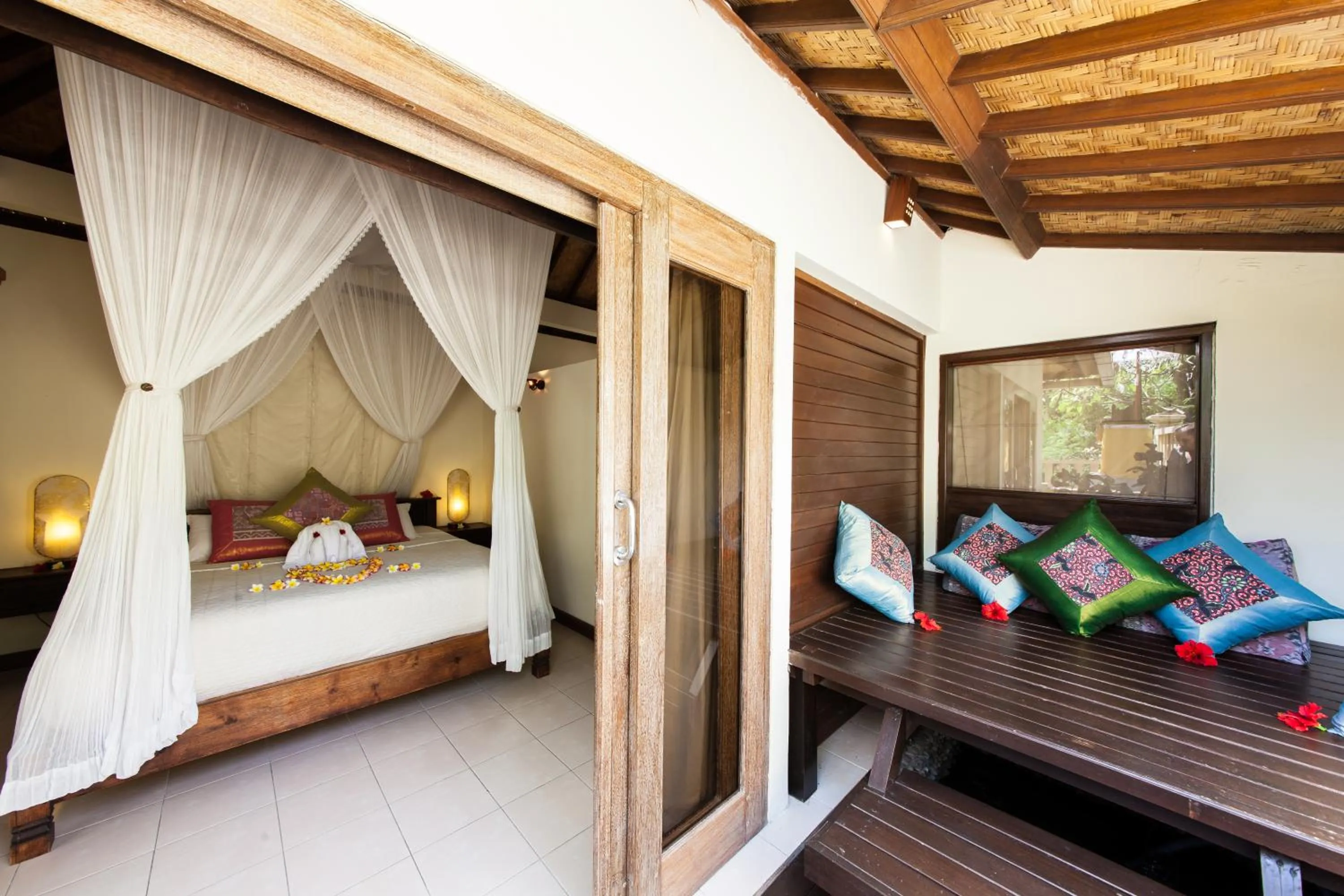 Patio, Bed in Blue Moon Villas Resort