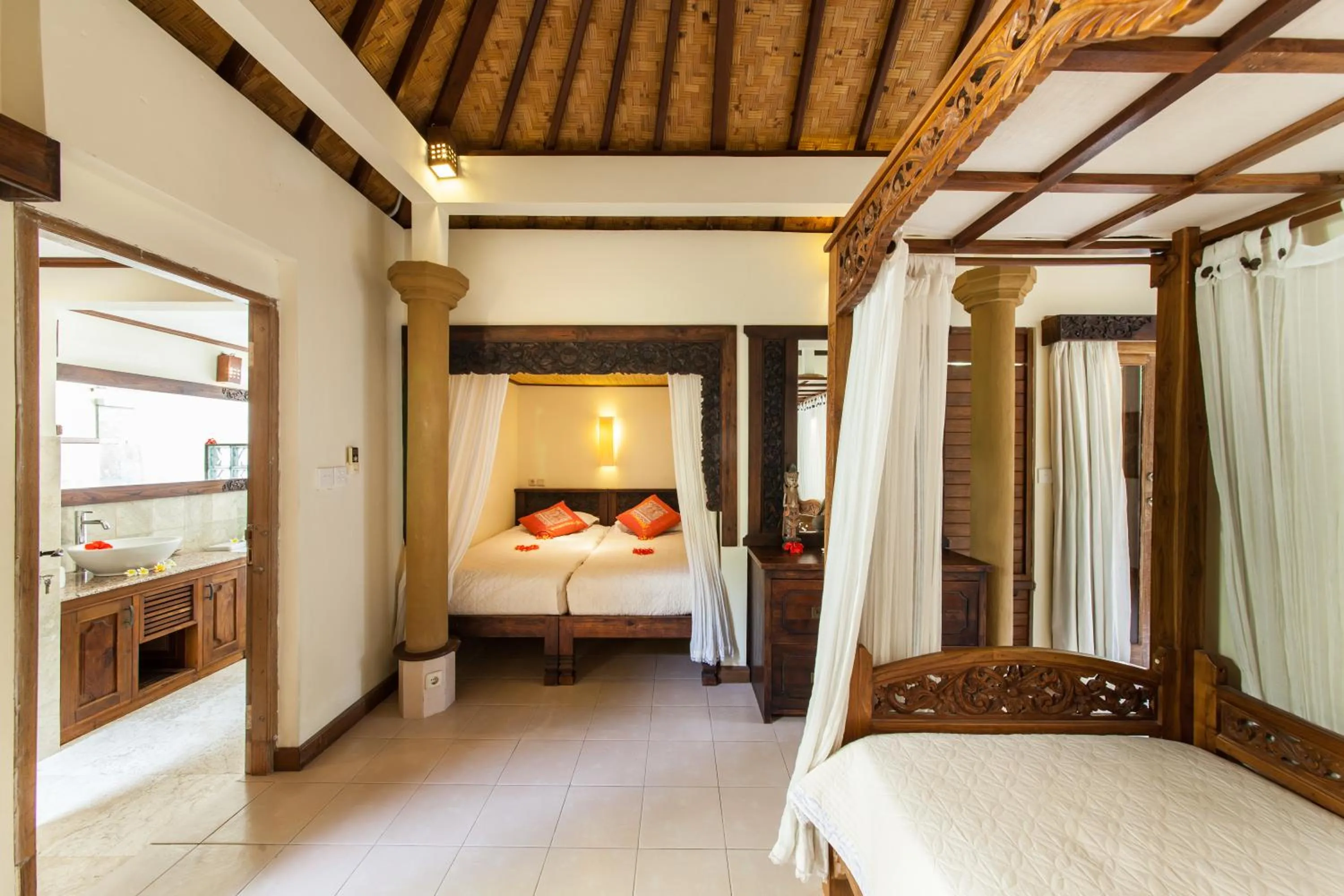 Bed in Blue Moon Villas Resort