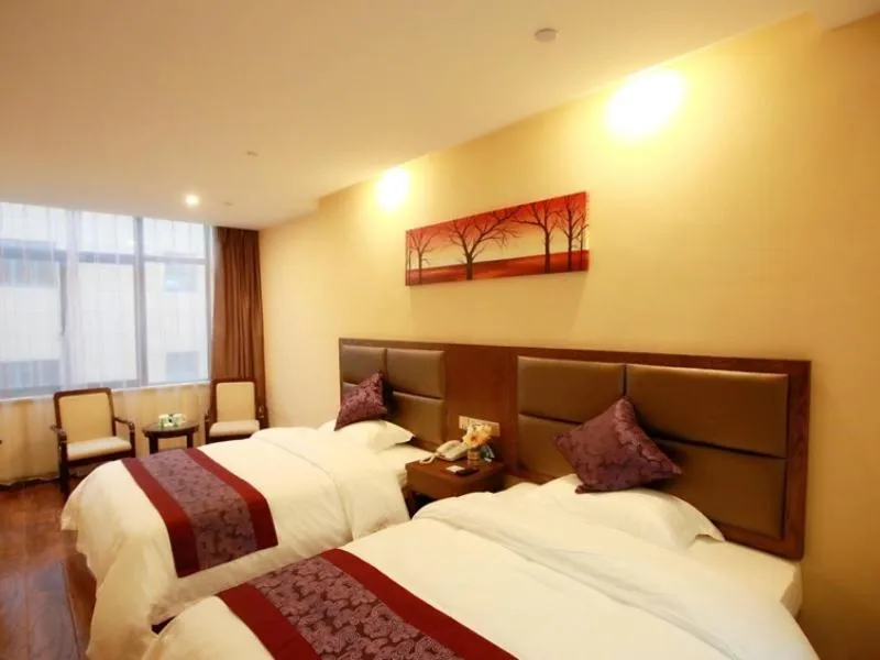 Bed in GreenTree Inn JiangSu NanTong HaiMen Shanghe Plaza Express Hotel