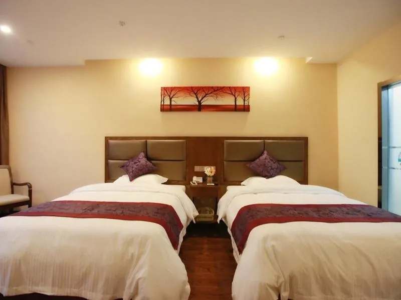 Bed in GreenTree Inn JiangSu NanTong HaiMen Shanghe Plaza Express Hotel