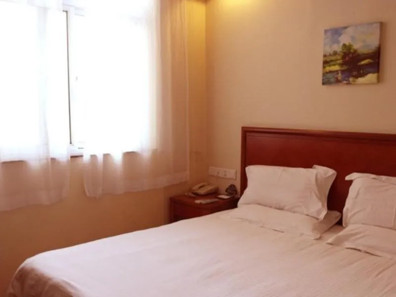 Bed in GreenTree Inn JiangSu HuaiAn QingPu District Huaihainan Road Express Hotel