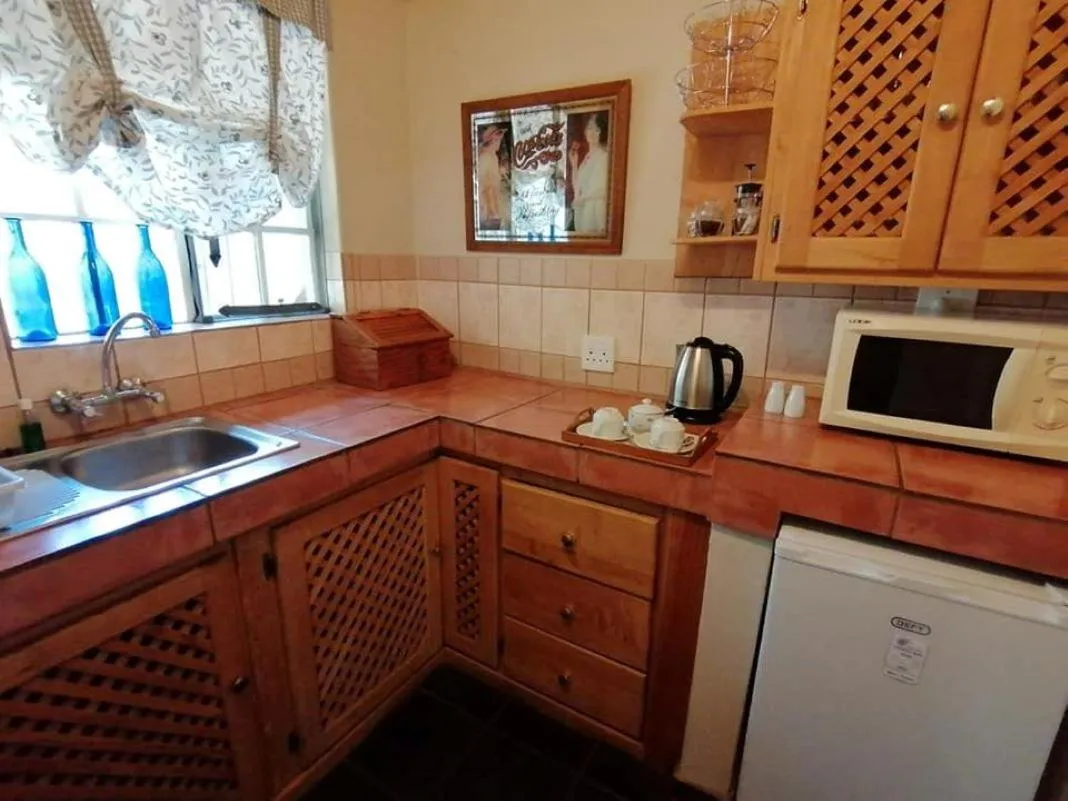 Kitchen or kitchenette in Idle & Wild Chalet