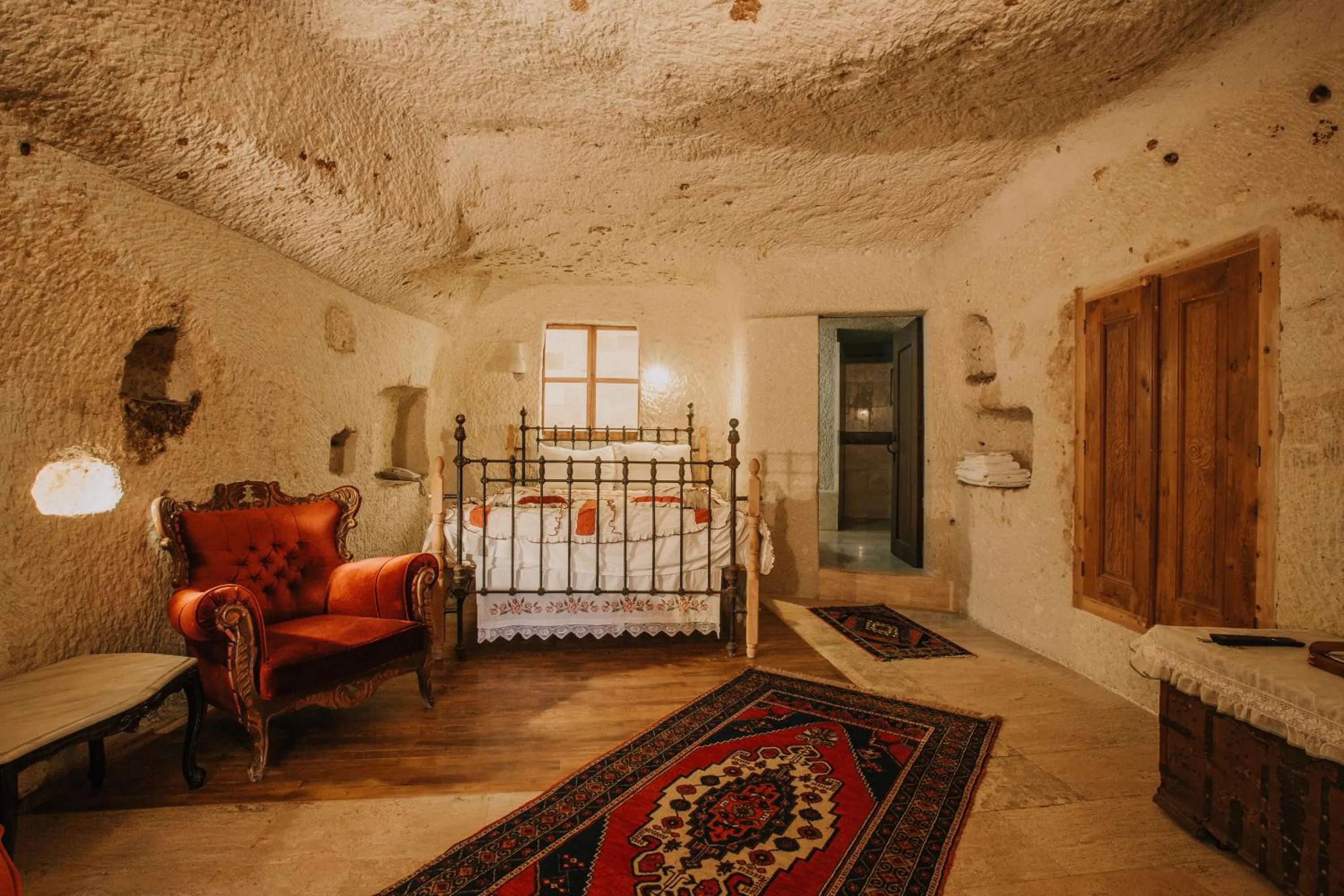 Bed in Village Cave House Hotel