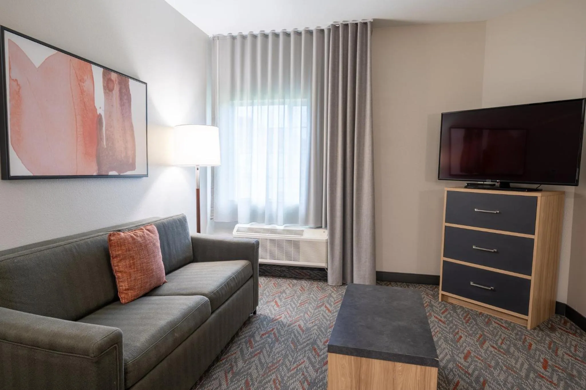 Bedroom in Candlewood Suites Deer Park by IHG