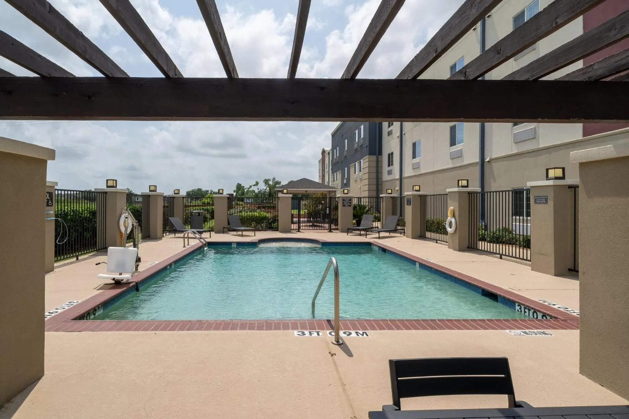 Swimming pool in Candlewood Suites Deer Park by IHG