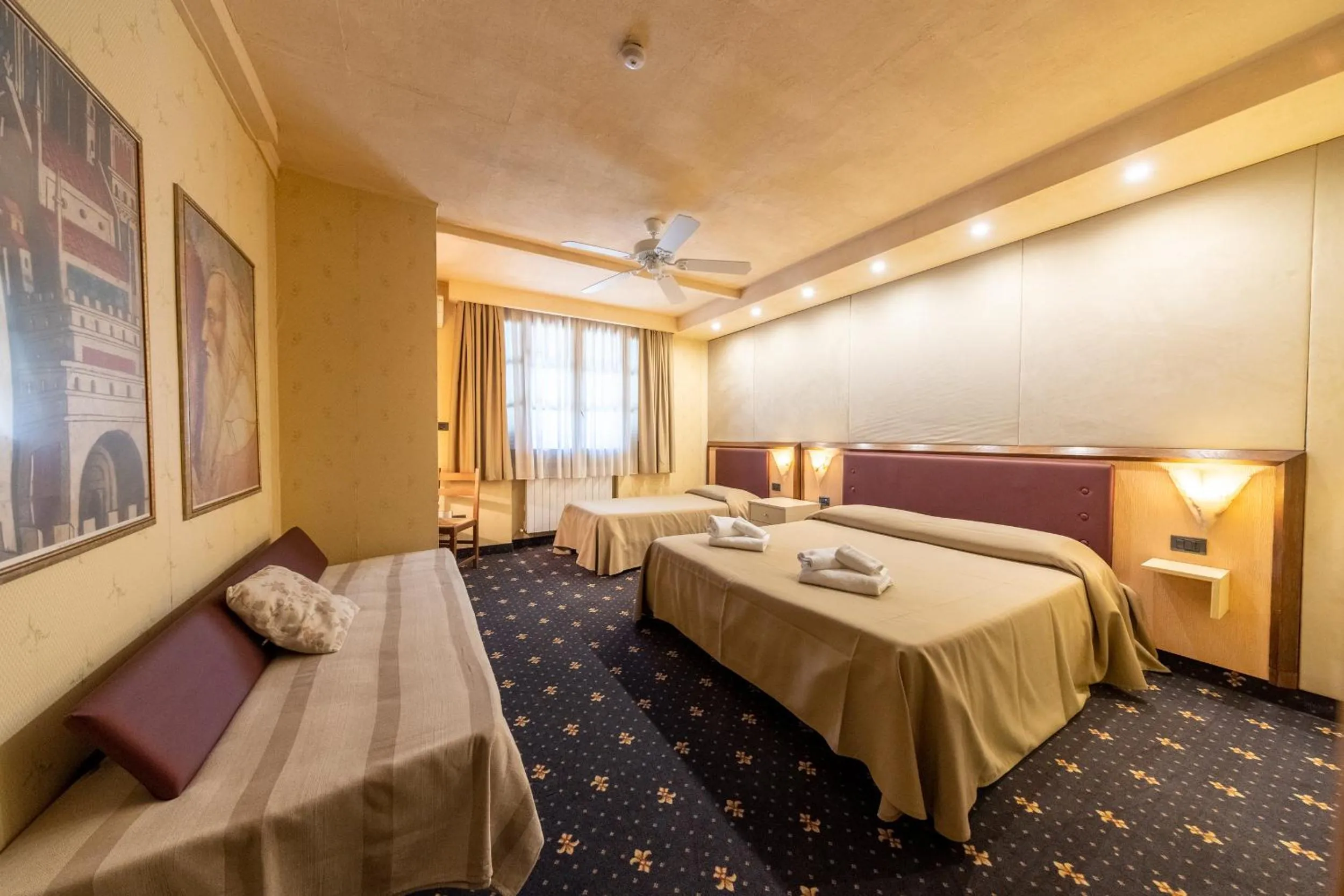 Bed in Hotel Antica Badia Volterra