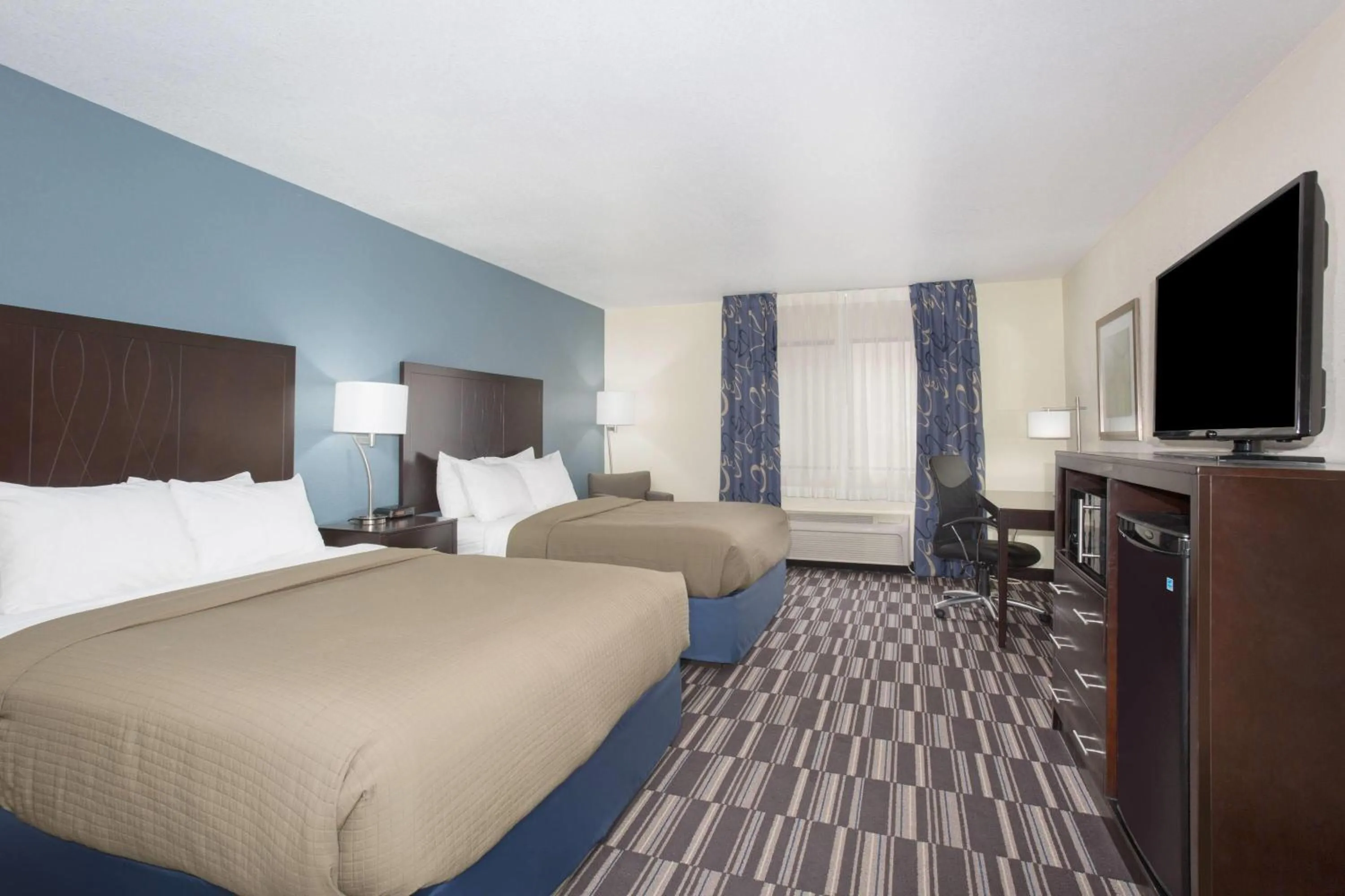 Photo of the whole room, Bed in AmericInn by Wyndham Mount Pleasant