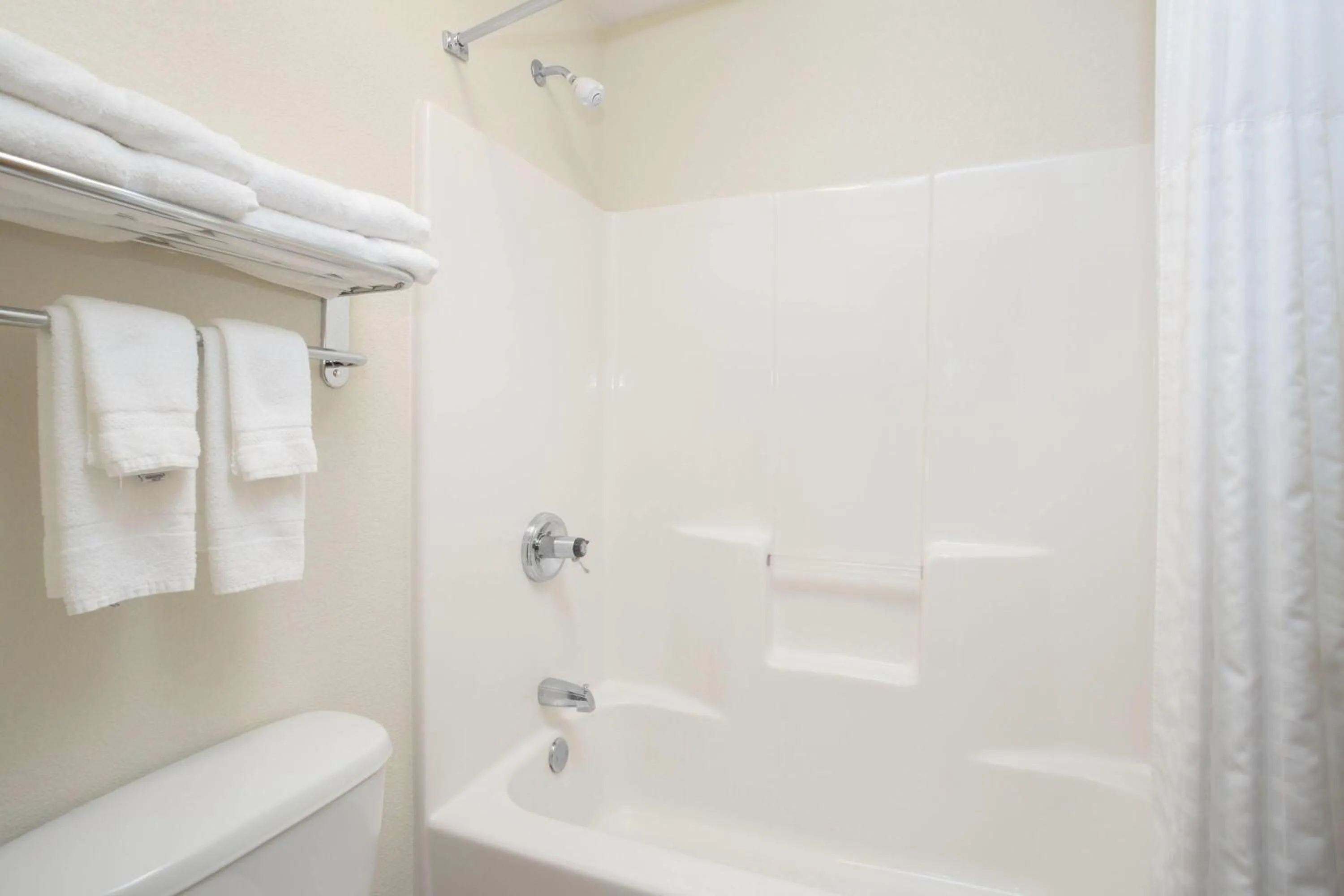 Bathroom in AmericInn by Wyndham Mount Pleasant