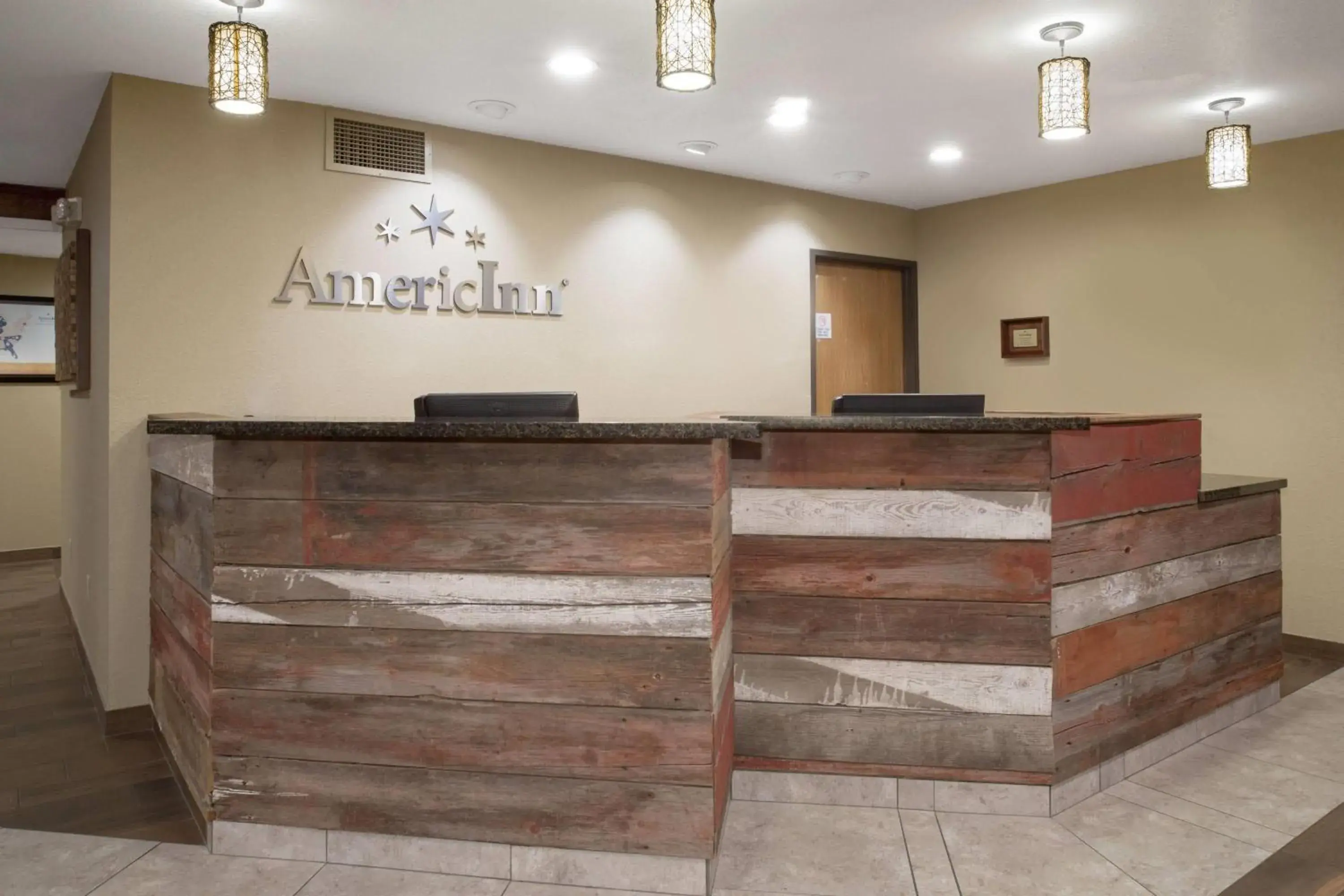 Lobby or reception in AmericInn by Wyndham Mount Pleasant Lobby or reception in AmericInn by Wyndham Mount Pleasant