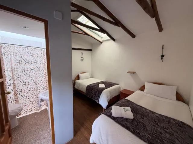 Bed in Parwa Guest House