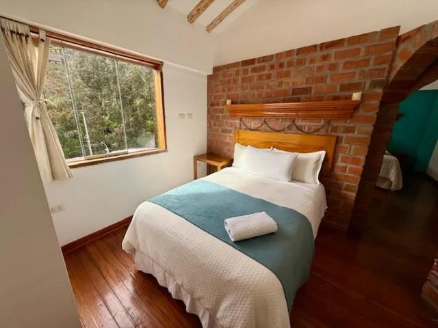 Bed in Parwa Guest House