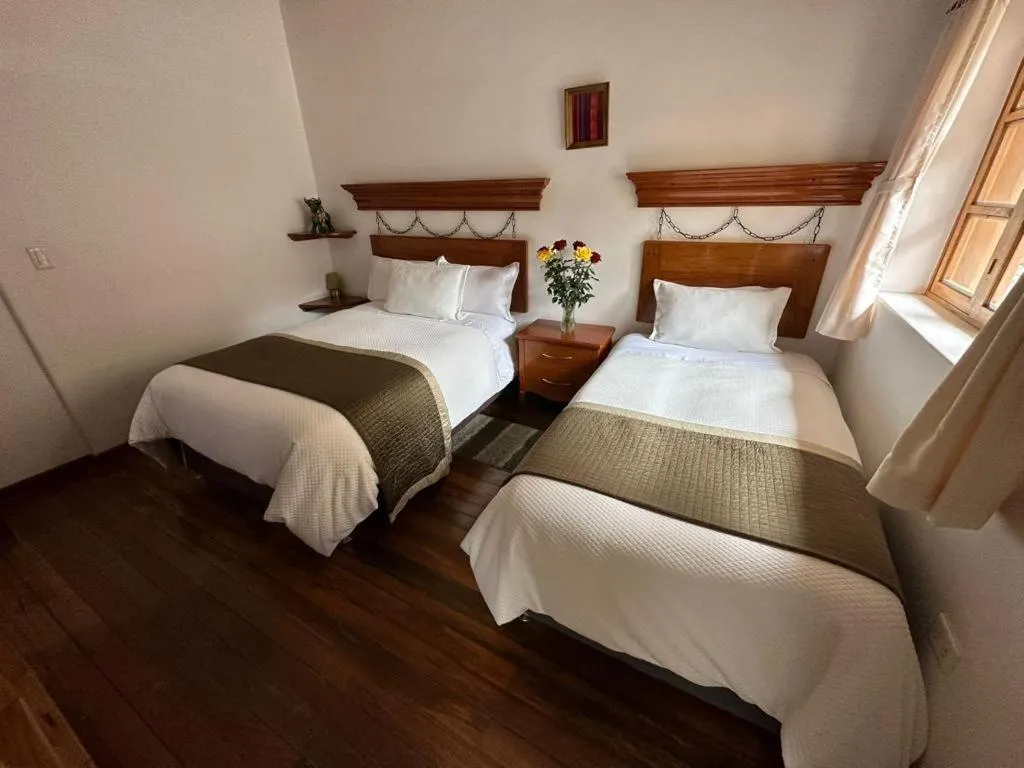 Bed in Parwa Guest House