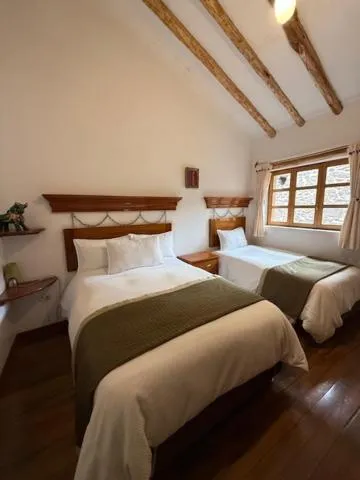 Bed in Parwa Guest House