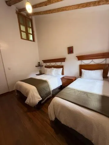Bed in Parwa Guest House