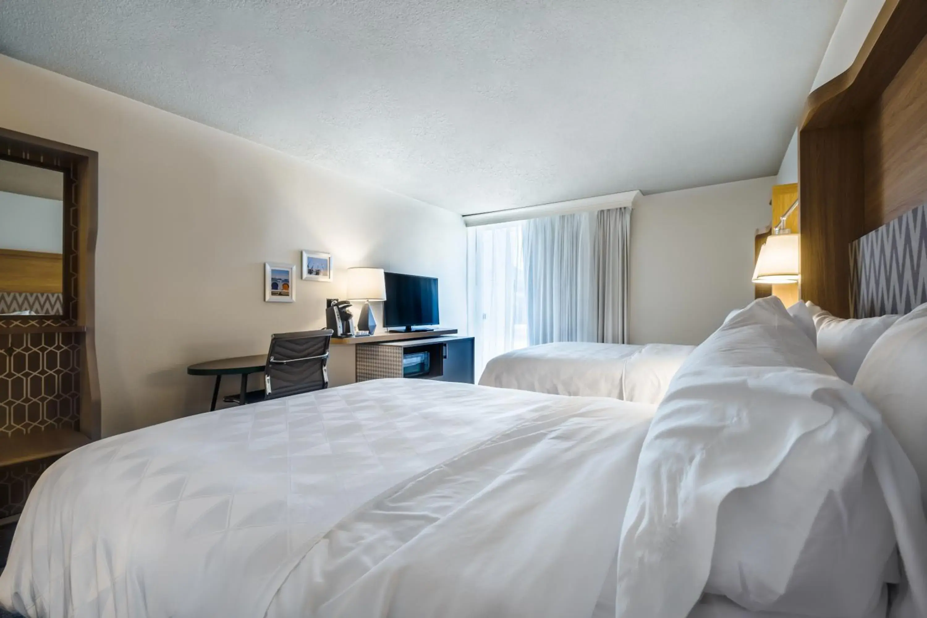 Standard Room with Two Queen Beds - Communications Accessible Tub in Holiday Inn Grand Haven-Spring Lake by IHG Standard Room with Two Queen Beds - Communications Accessible Tub in Holiday Inn Grand Haven-Spring Lake by IHG