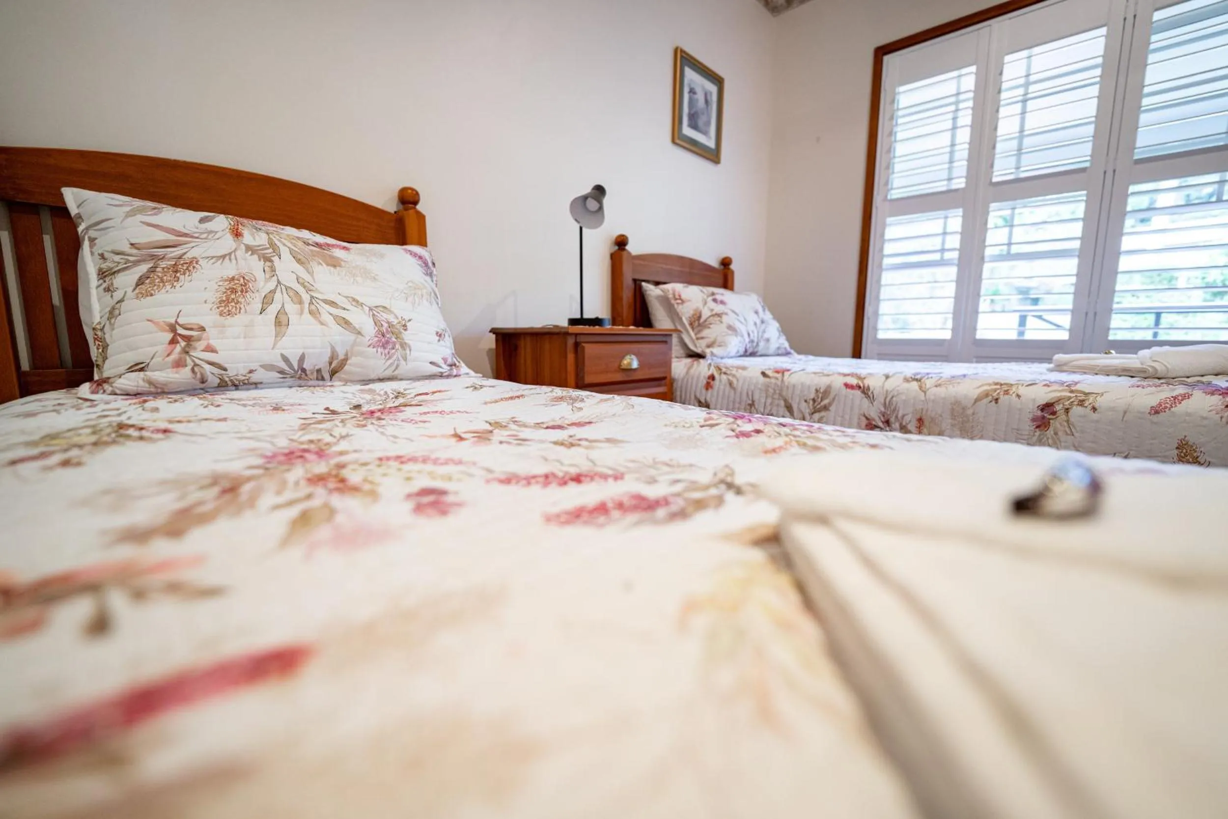 Bed in Birds 'n' Bloom Cottages