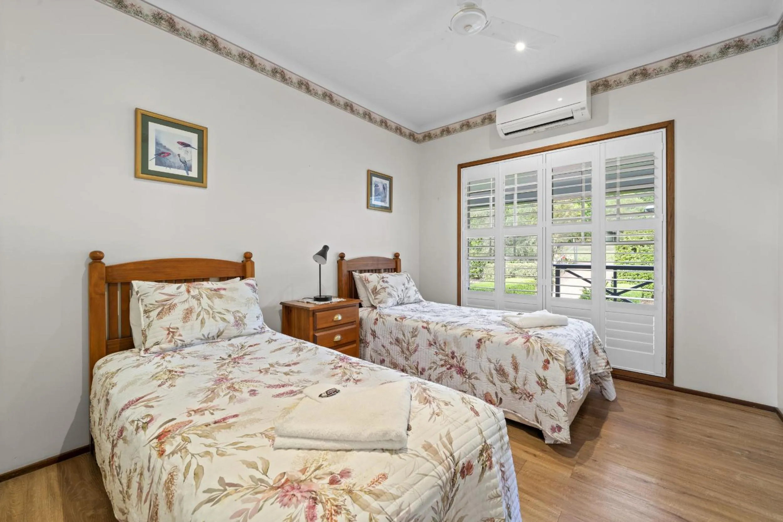 Bed in Birds 'n' Bloom Cottages
