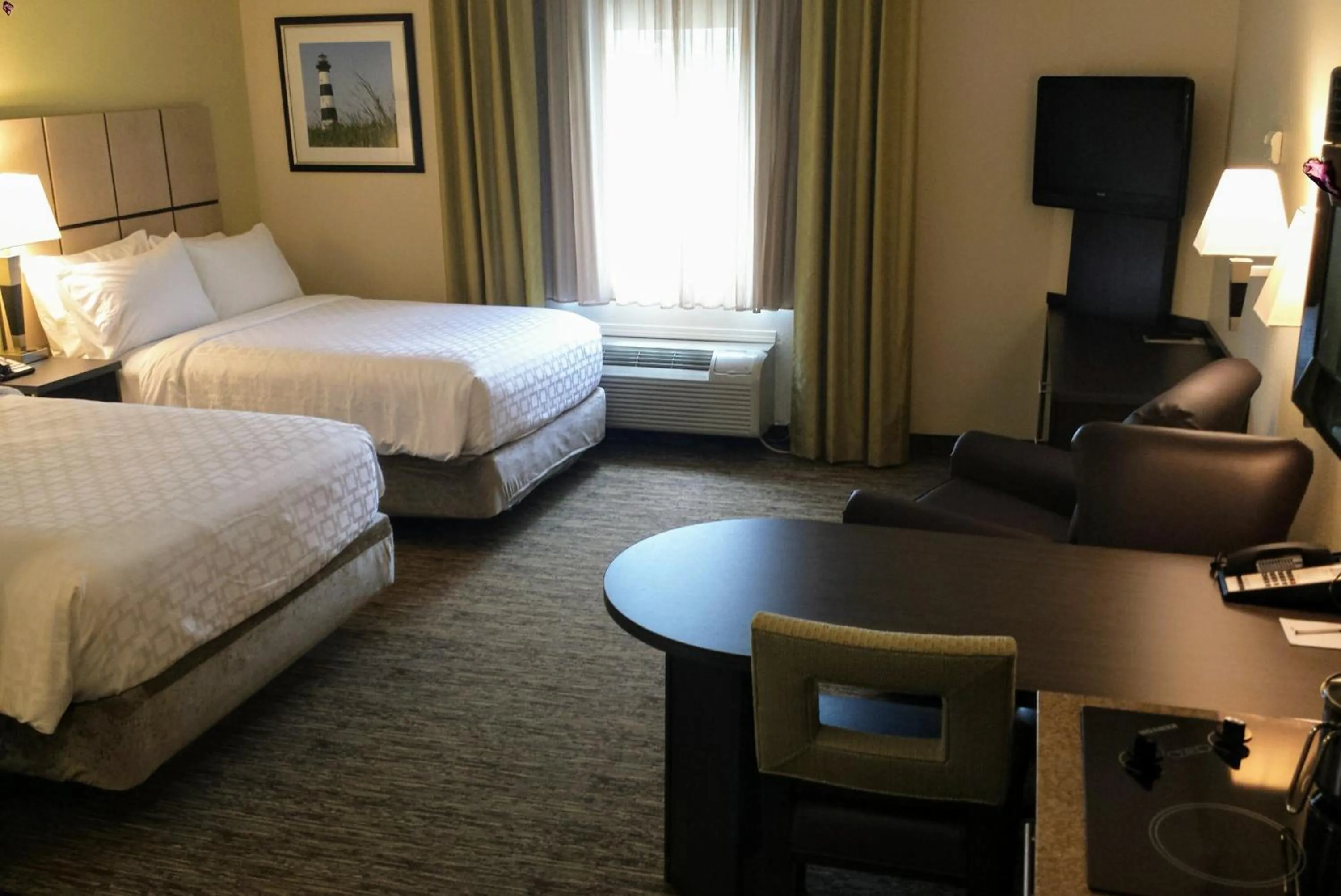 Photo of the whole room, Bed in Candlewood Suites Greenville NC by IHG