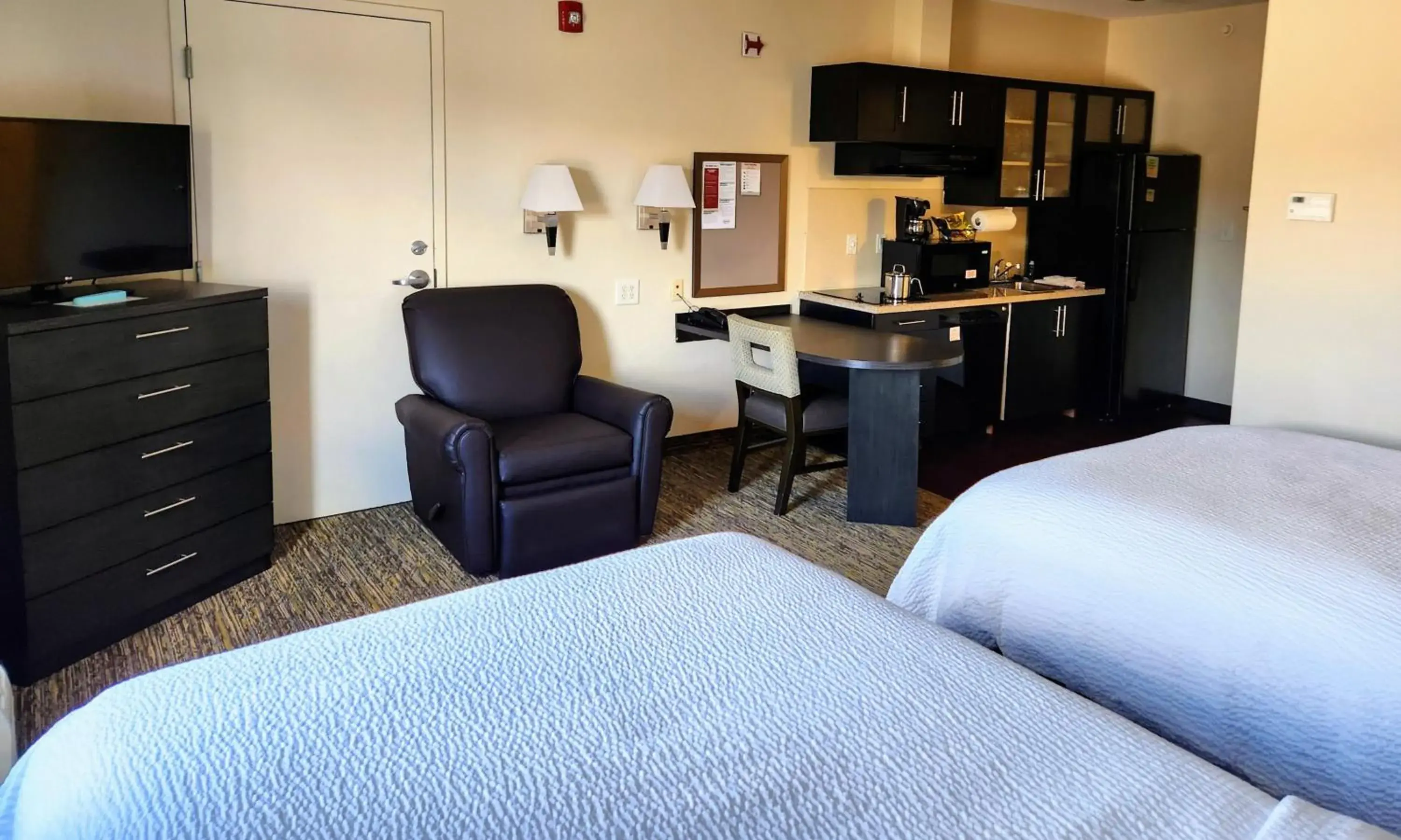 Photo of the whole room, Bed in Candlewood Suites Greenville NC by IHG Photo of the whole room, Bed in Candlewood Suites Greenville NC by IHG
