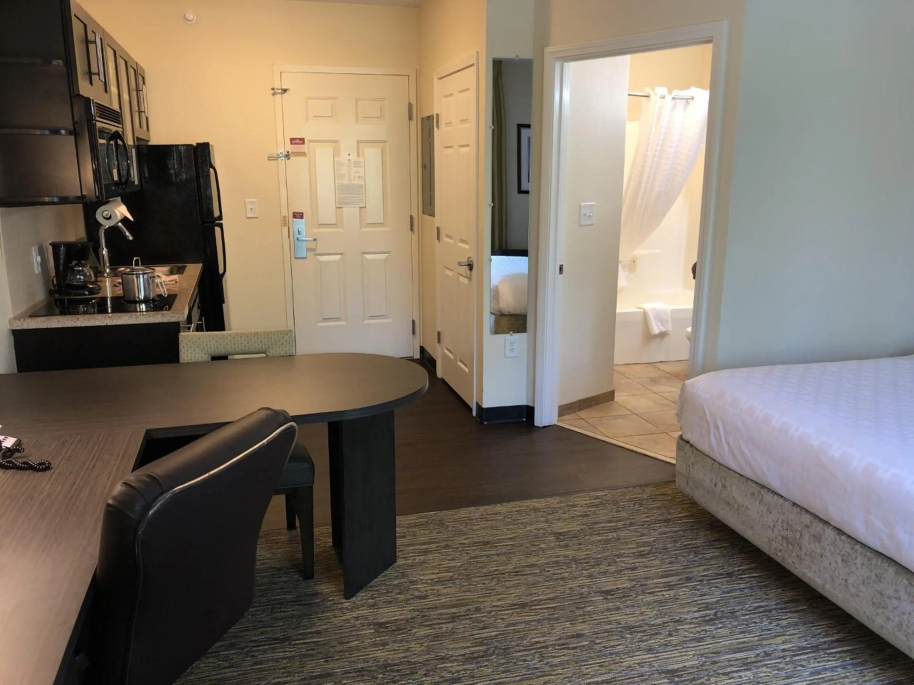 Photo of the whole room, Bed in Candlewood Suites Greenville NC by IHG