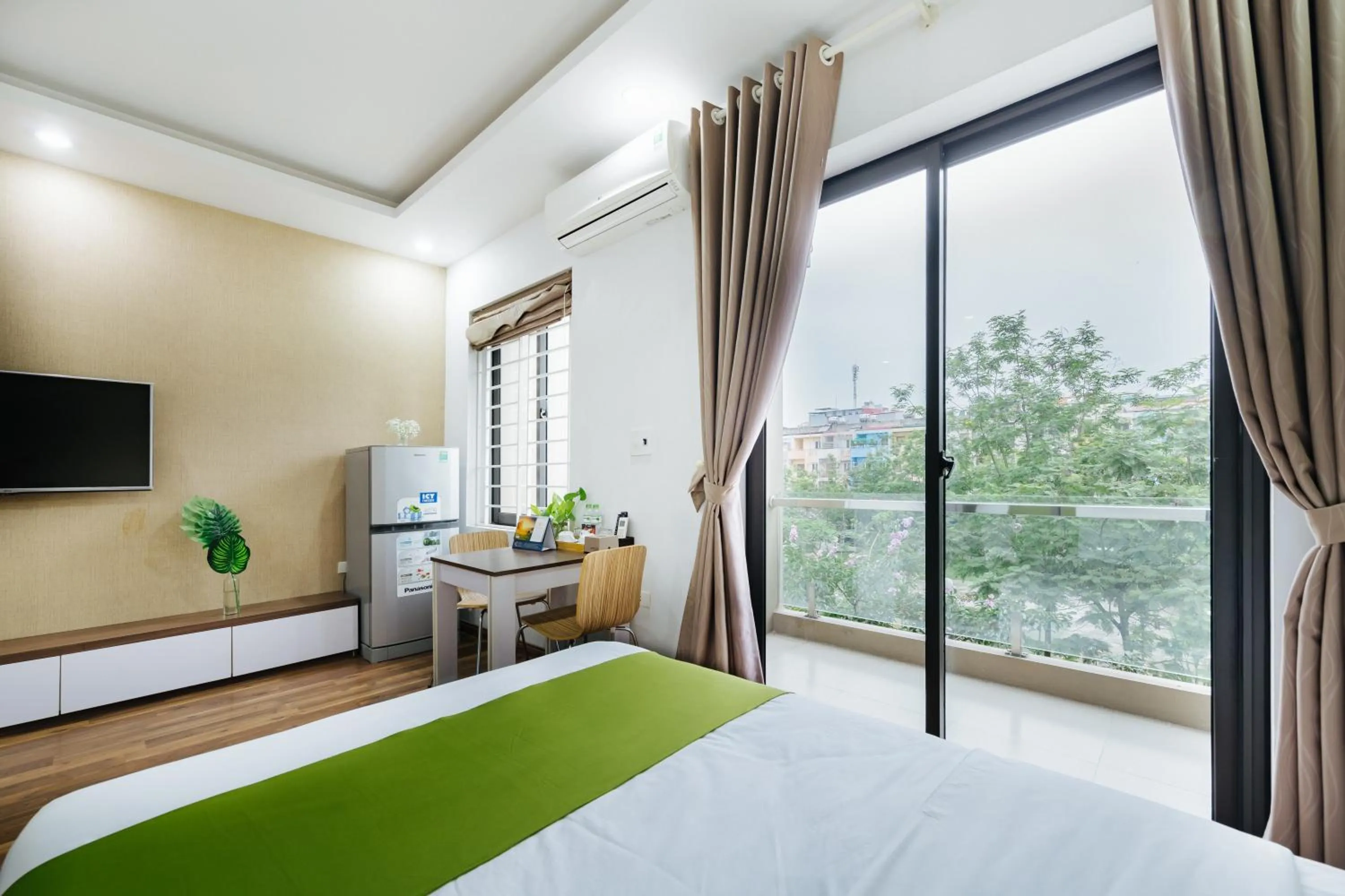 Communal lounge/ TV room, Bed in Hana 1 Apartment & Hotel Bac Ninh