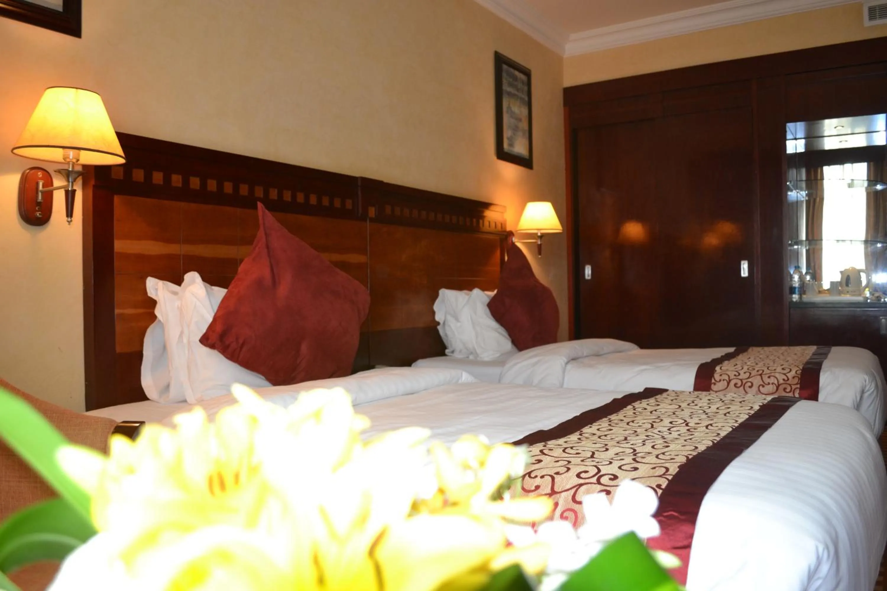 Bed in Ramada Riyadh Hotel
