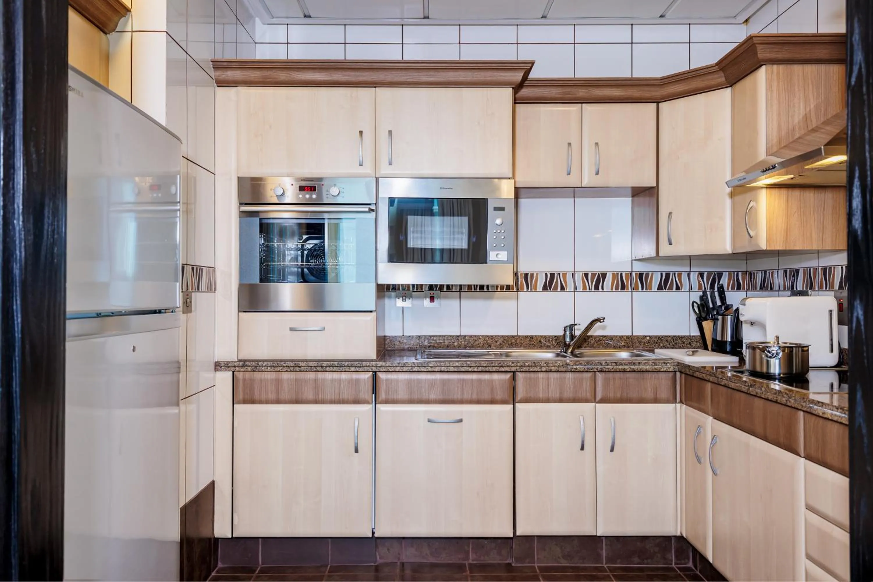 Kitchen or kitchenette in Kempinski Residences & Suites, Doha
