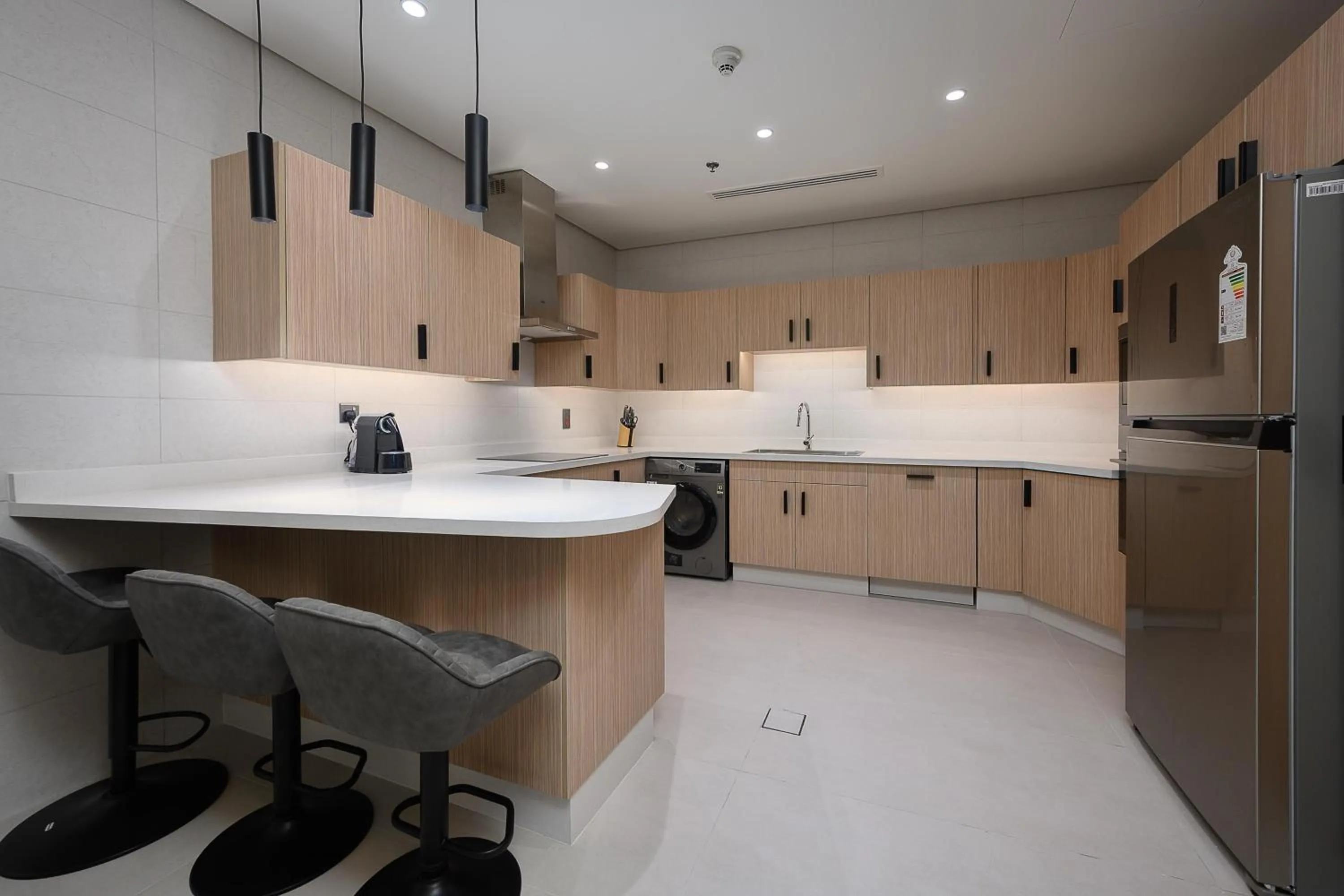 Kitchen or kitchenette in Kempinski Residences & Suites, Doha