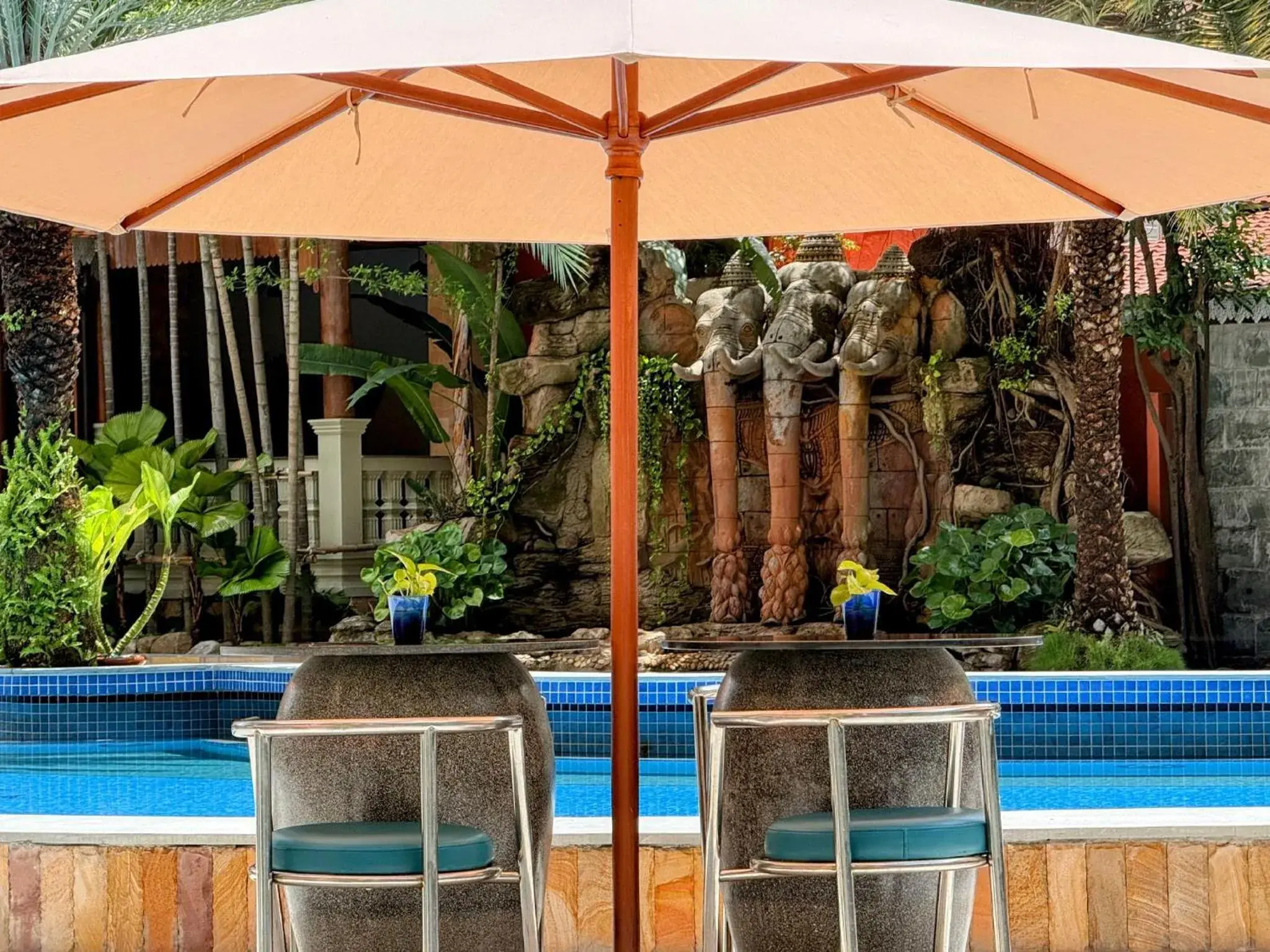 Swimming pool in Empress Angkor Resort & Spa Swimming pool in Empress Angkor Resort & Spa