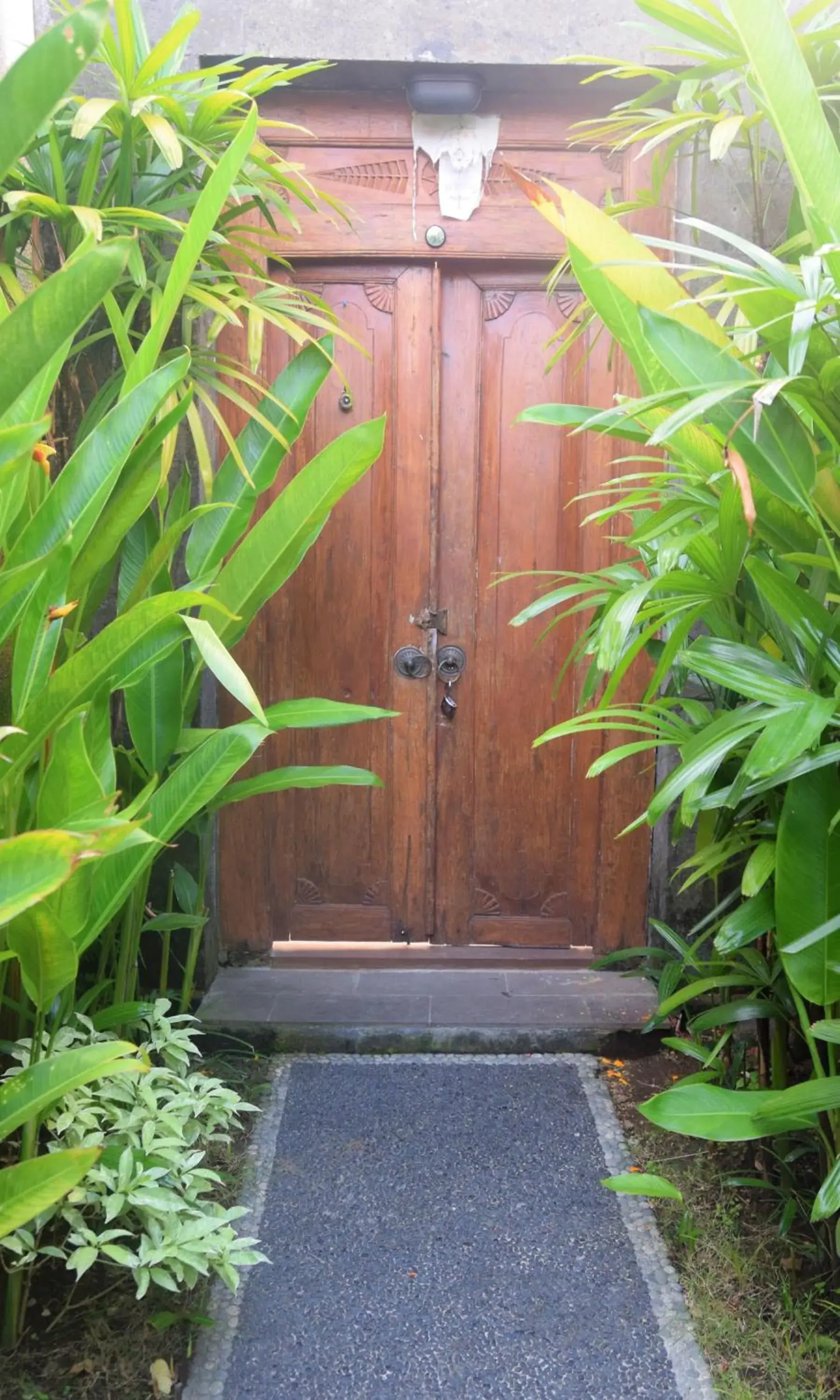 Facade/entrance in Taman Amertha Villas by Maha Bali Facade/entrance in Taman Amertha Villas by Maha Bali