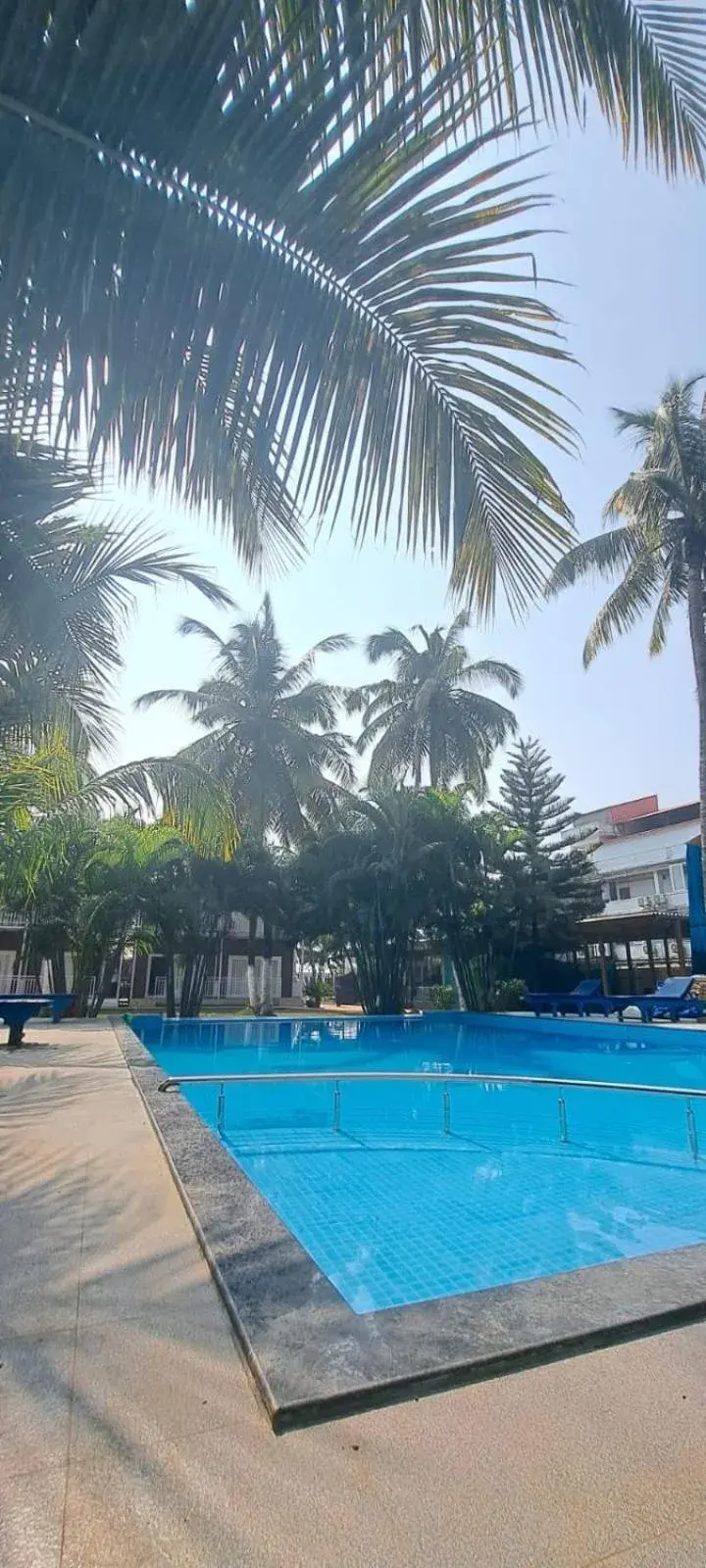 Swimming pool in Shaan Coco Palms Beach Resort Swimming pool in Shaan Coco Palms Beach Resort