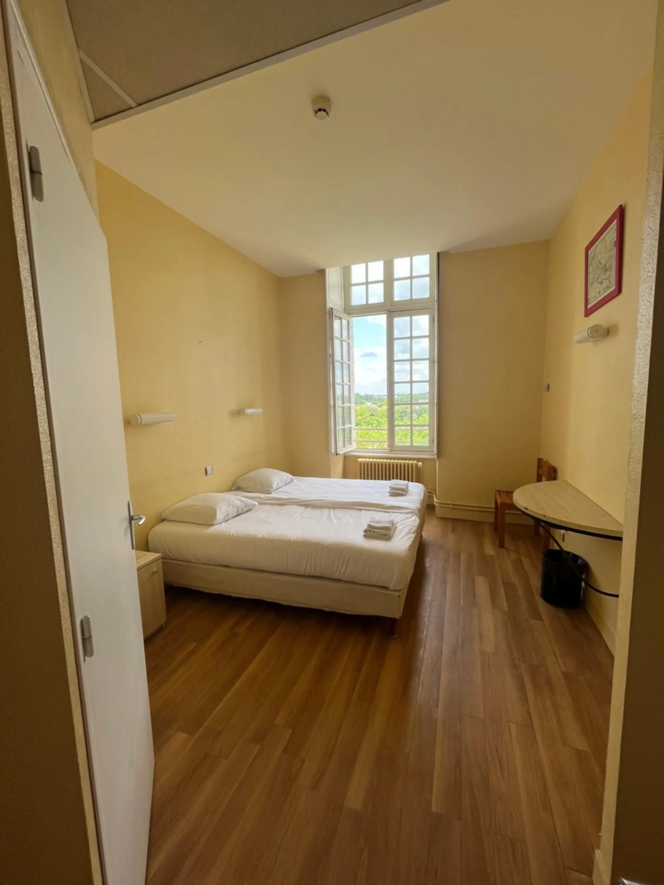 Bed in Hôtellerie Saint Yves