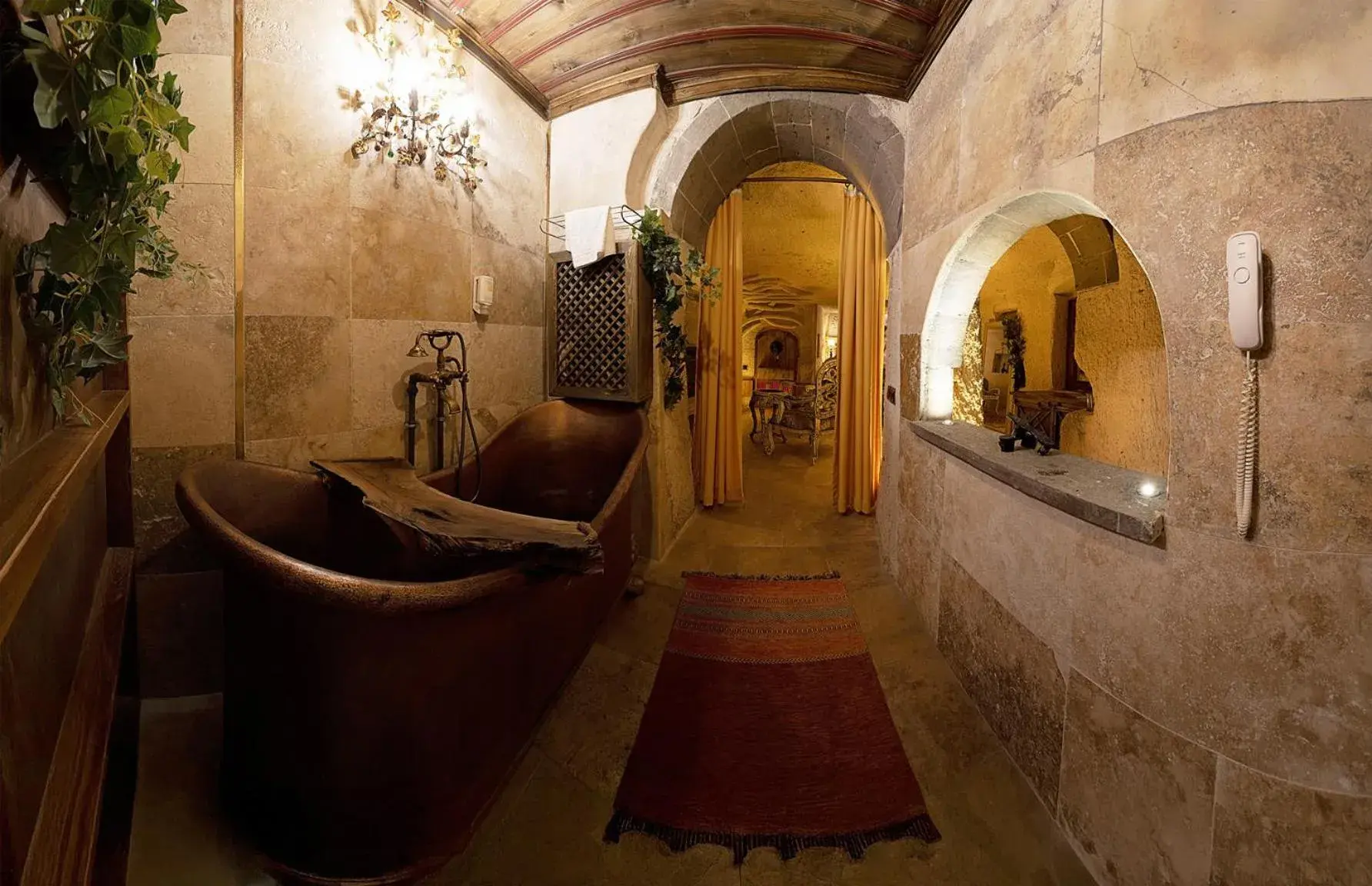 Luxury Cave Room with Wine Fountain and Copper Bathtub in Wish Cappadocia Luxury Boutique Chain Hotels Luxury Cave Room with Wine Fountain and Copper Bathtub in Wish Cappadocia Luxury Boutique Chain Hotels