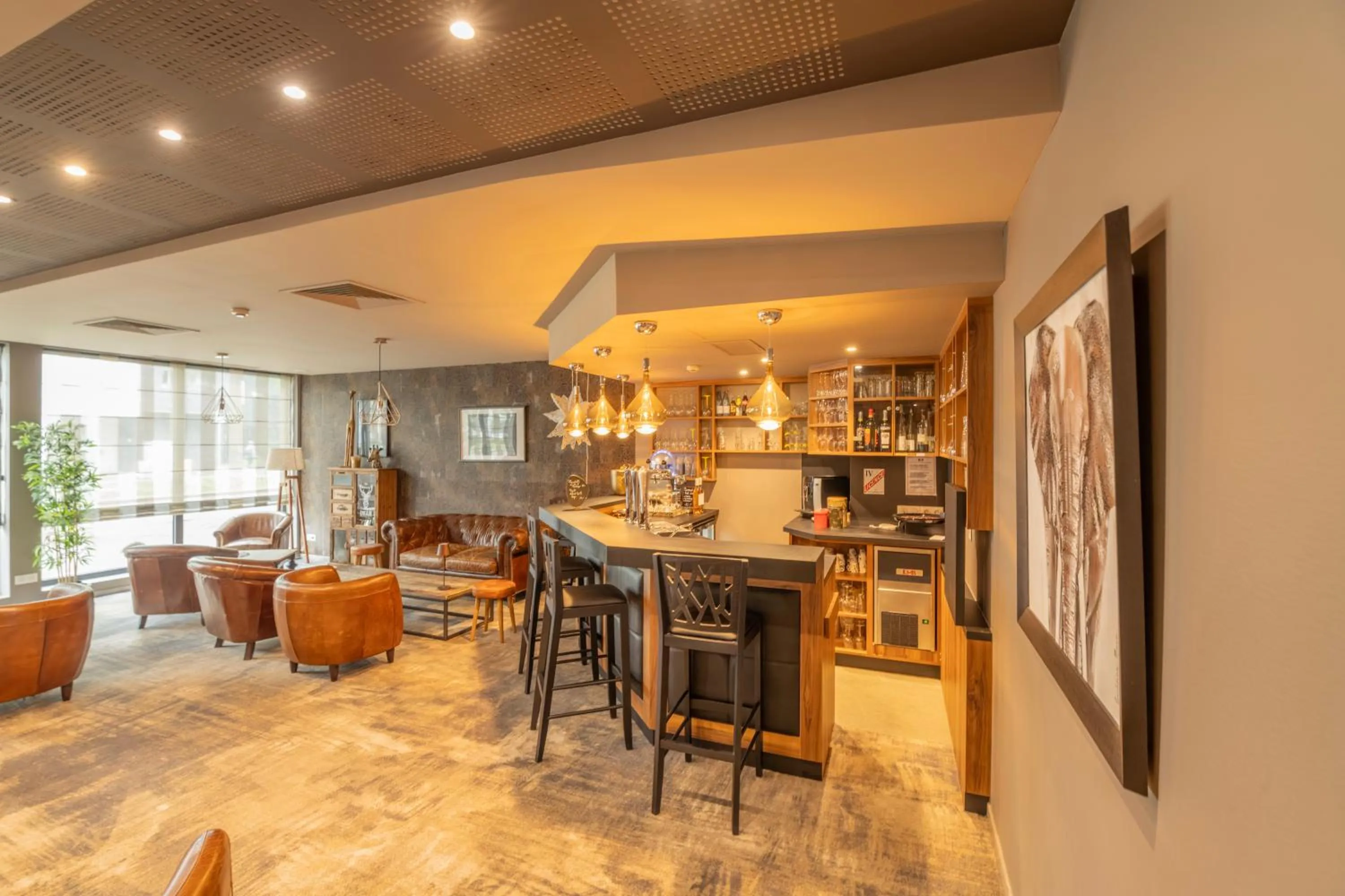 Lounge or bar in Le Lodge Brit Hotel Strasbourg Zenith