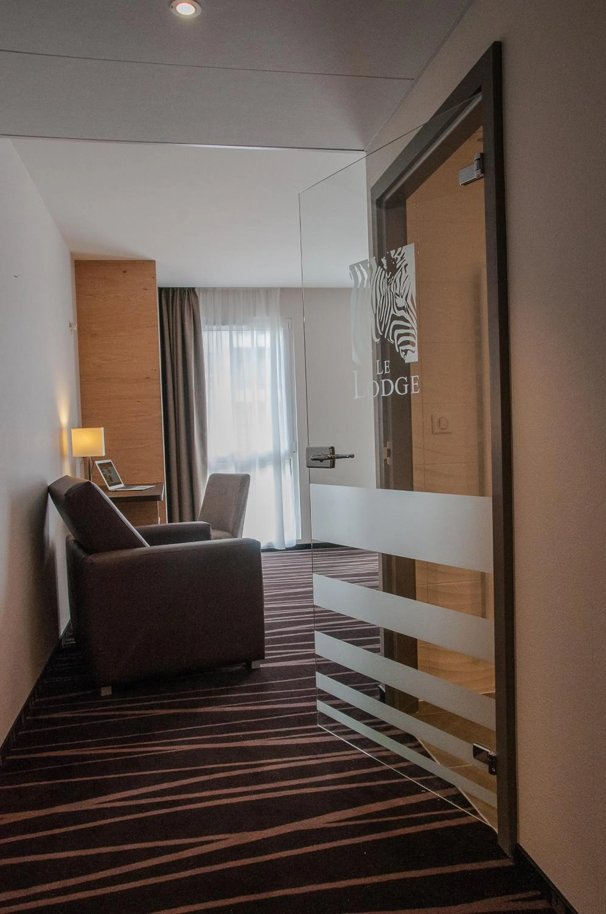 Bedroom in Le Lodge Brit Hotel Strasbourg Zenith