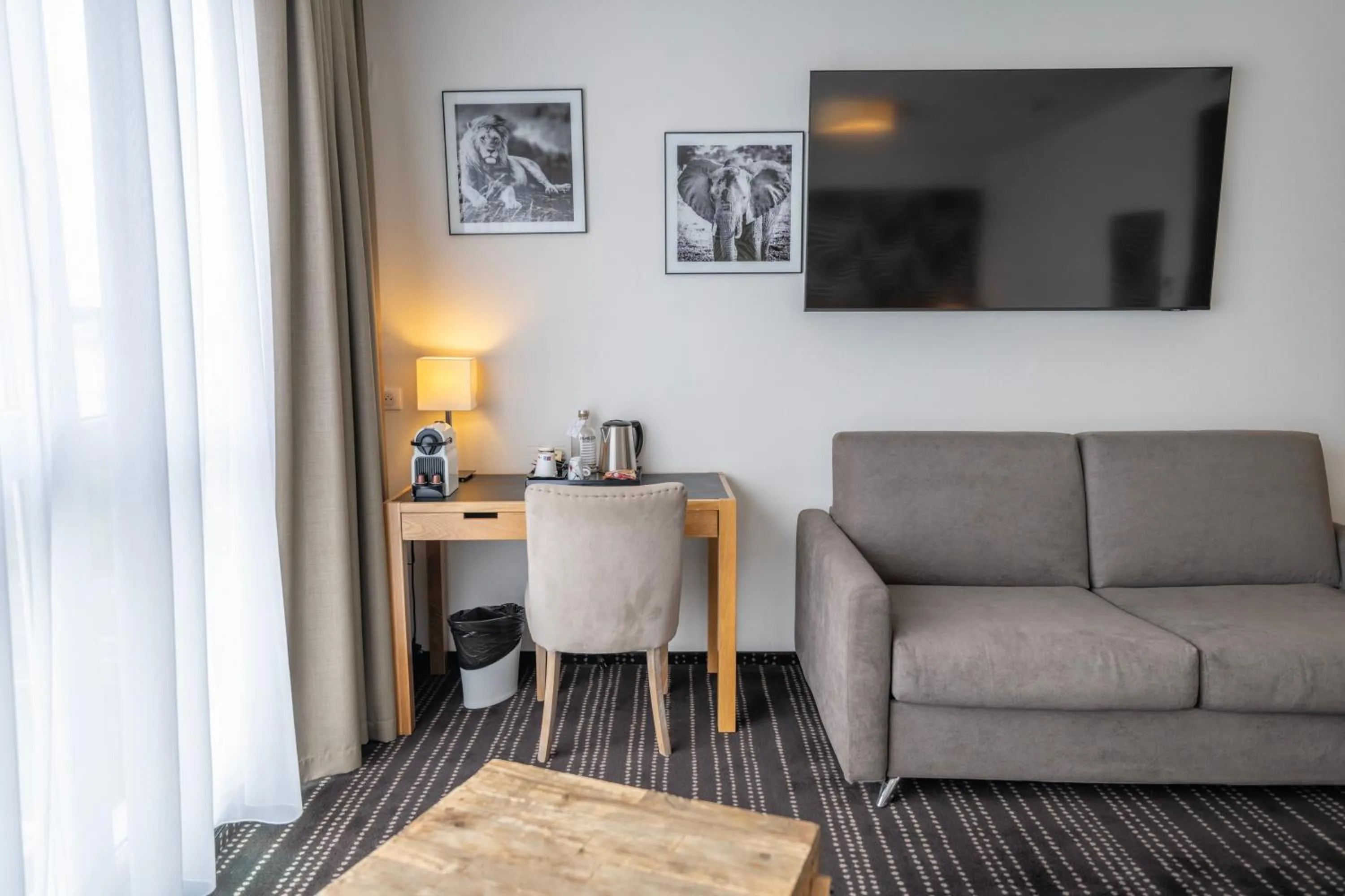 Living room in Le Lodge Brit Hotel Strasbourg Zenith