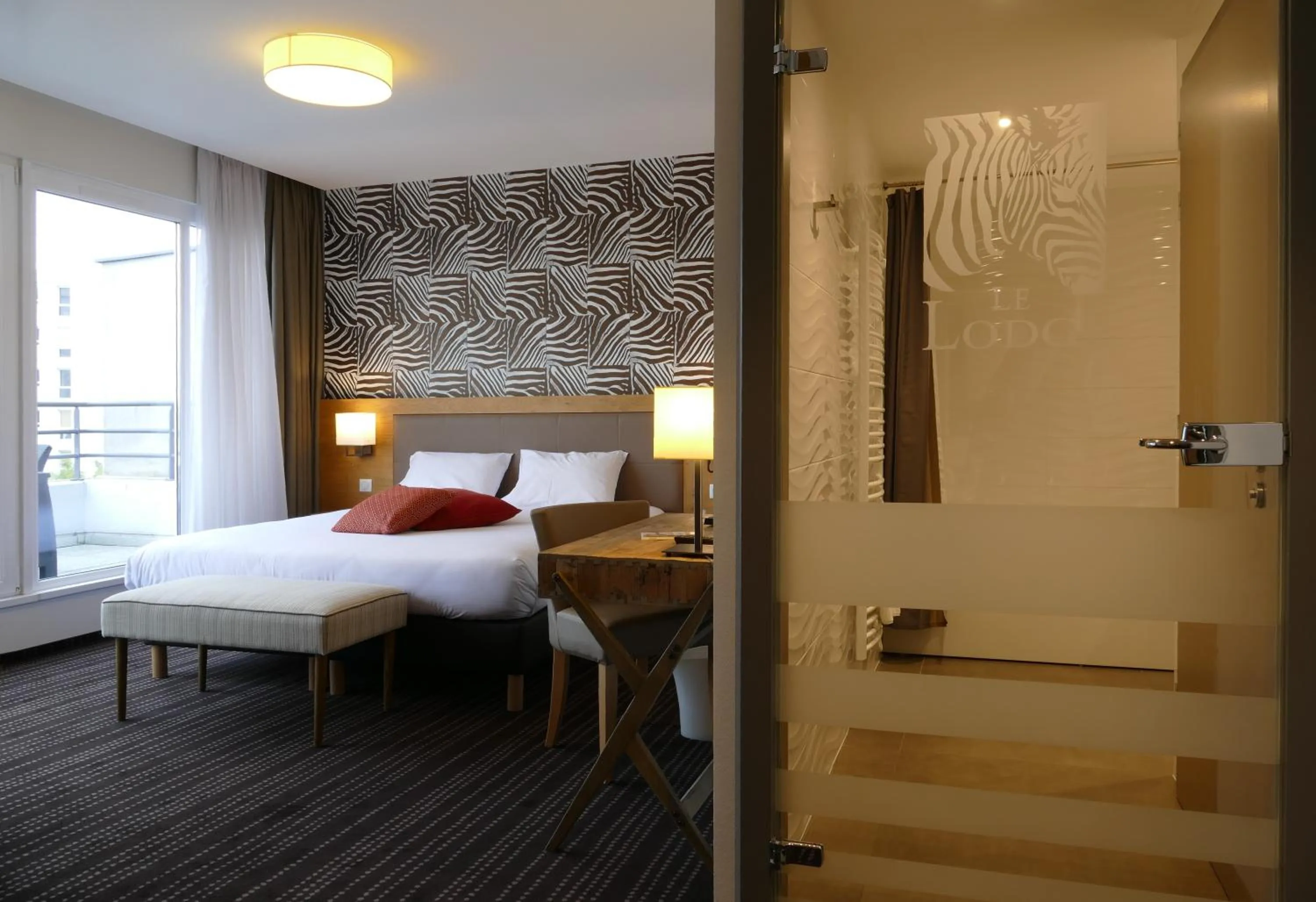 Bedroom, Bed in Le Lodge Brit Hotel Strasbourg Zenith