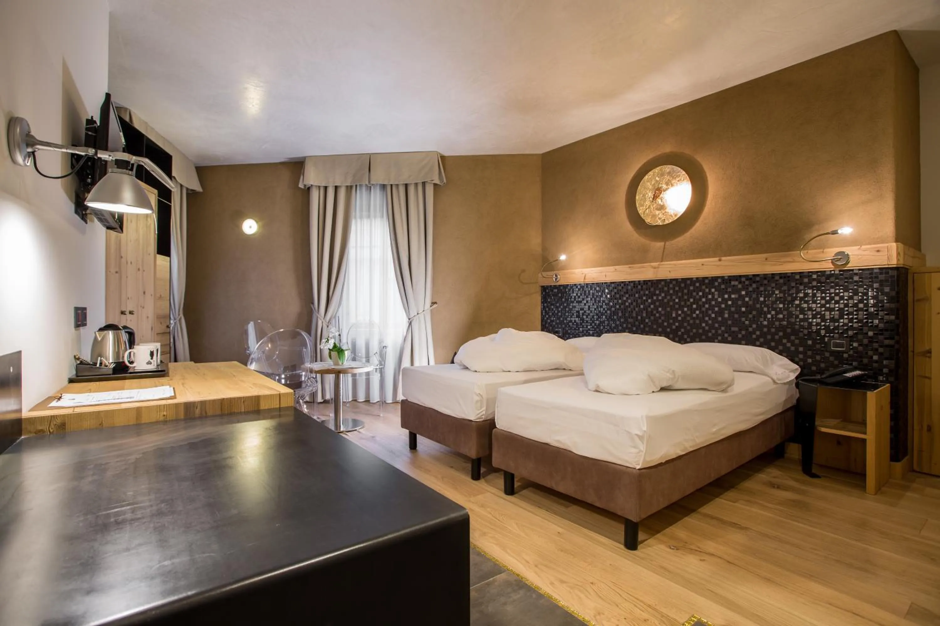 Bed in Hotel Orso Grigio