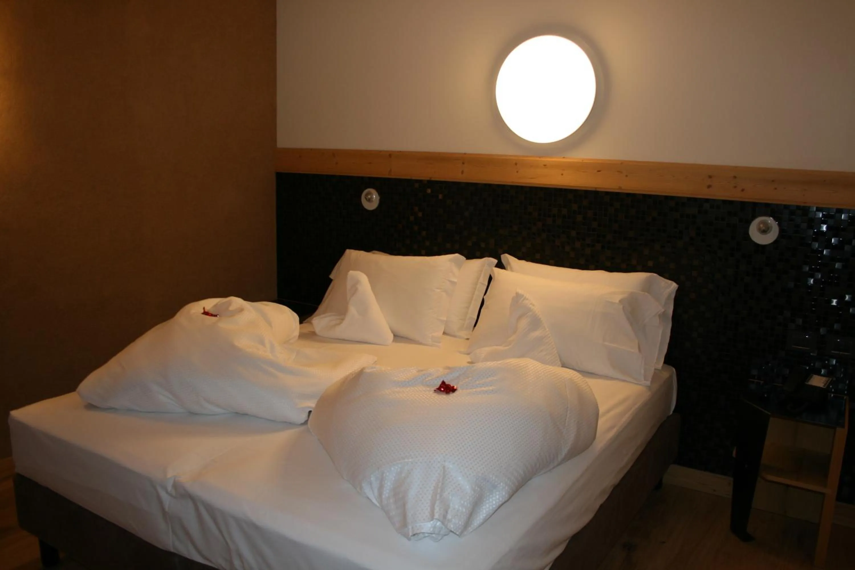 Bed in Hotel Orso Grigio