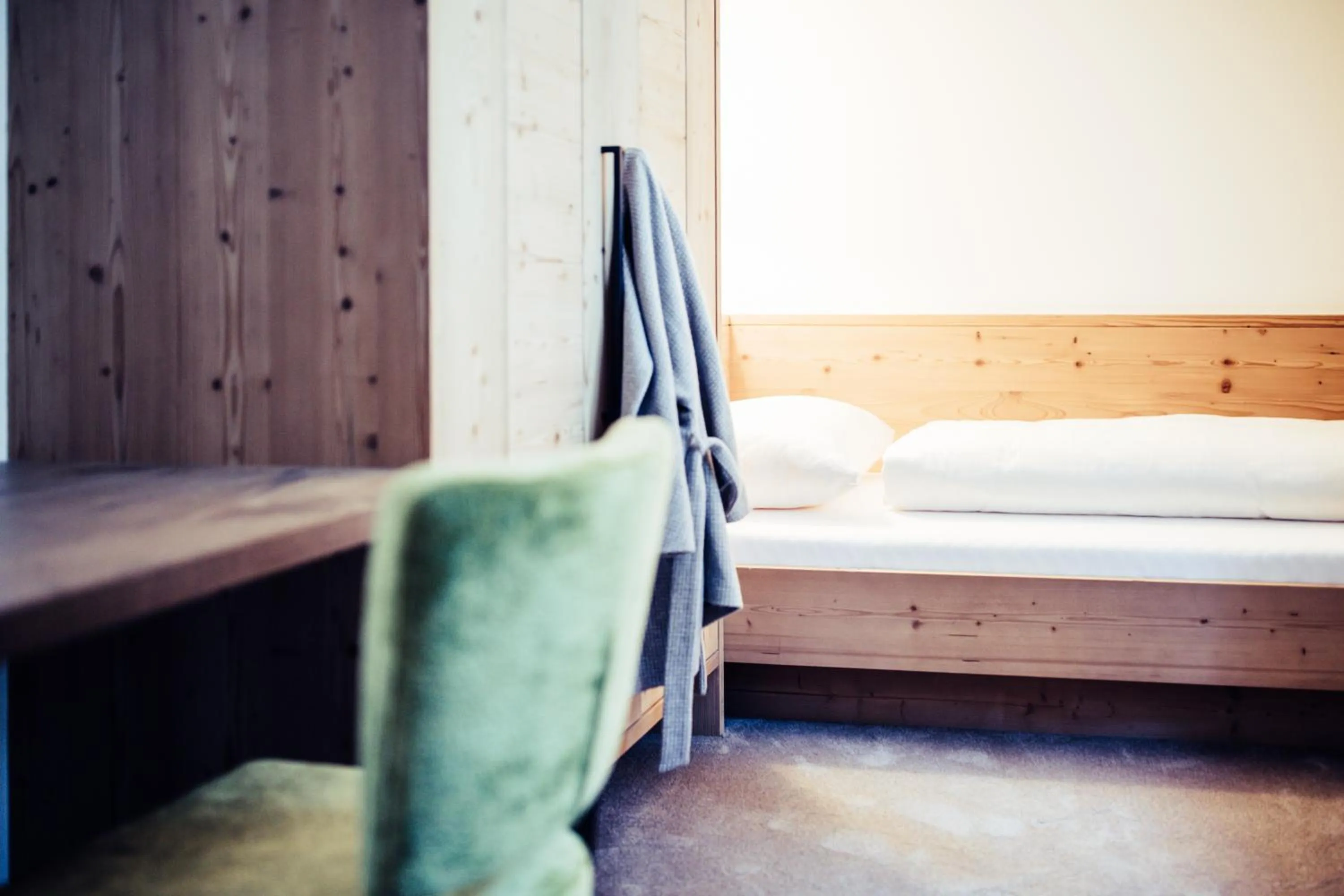 Photo of the whole room, Bed in Biohotel Bergzeit