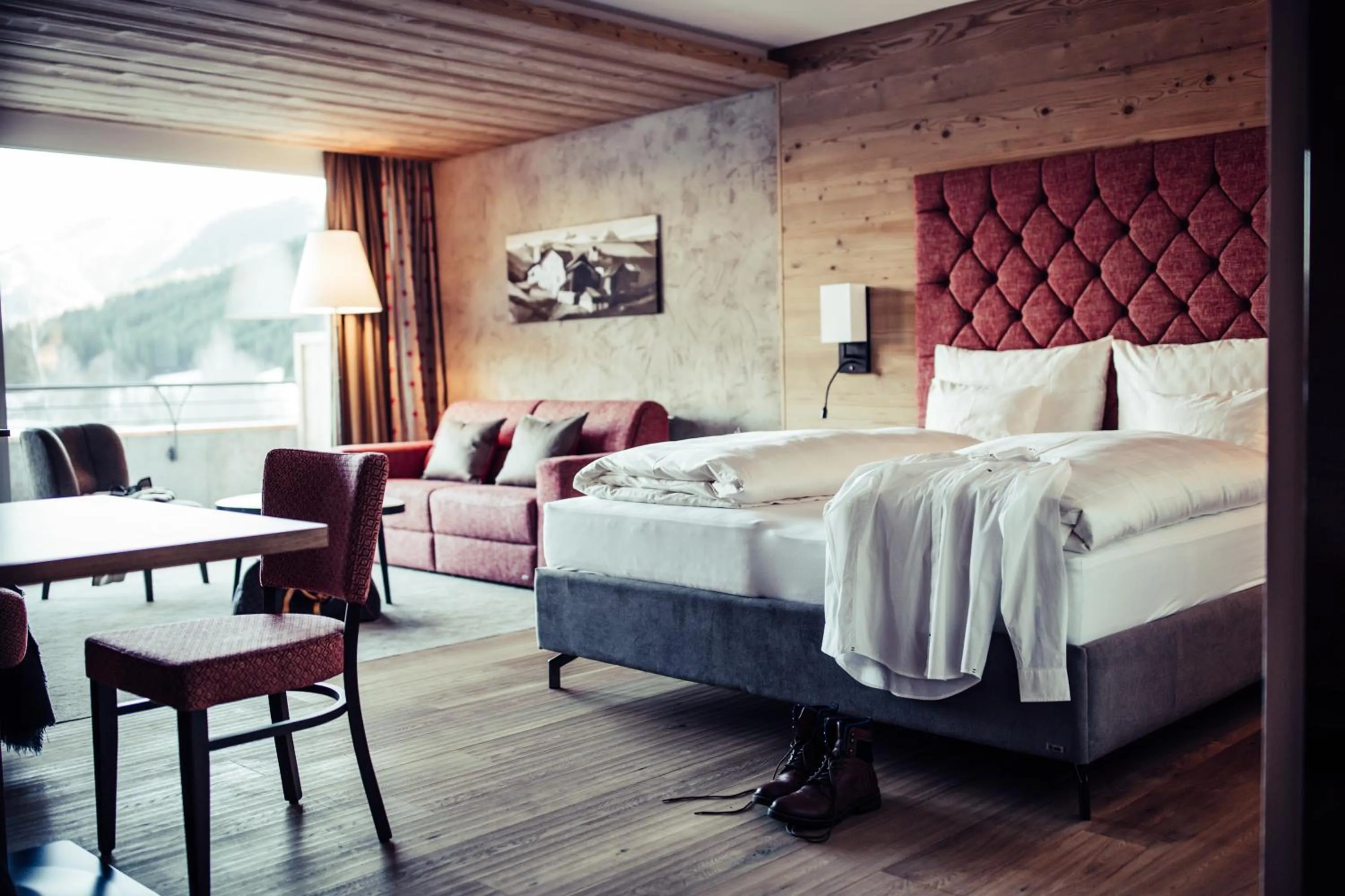 Photo of the whole room, Bed in Biohotel Bergzeit