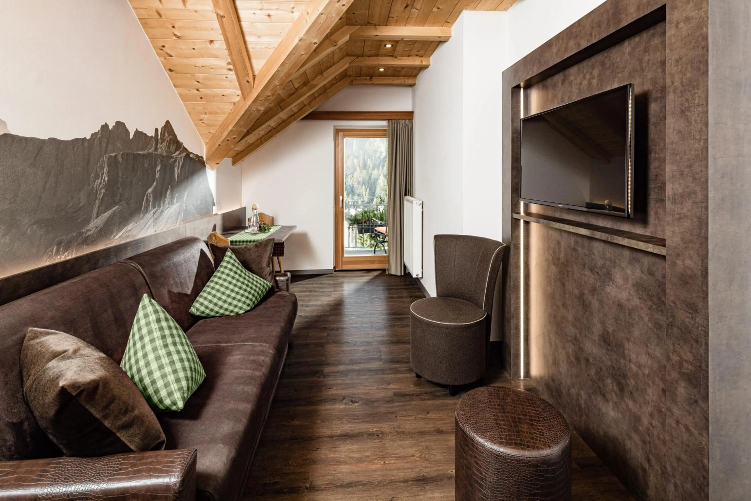 Living room in Boutique & Fashion Hotel Maciaconi - Gardenahotels