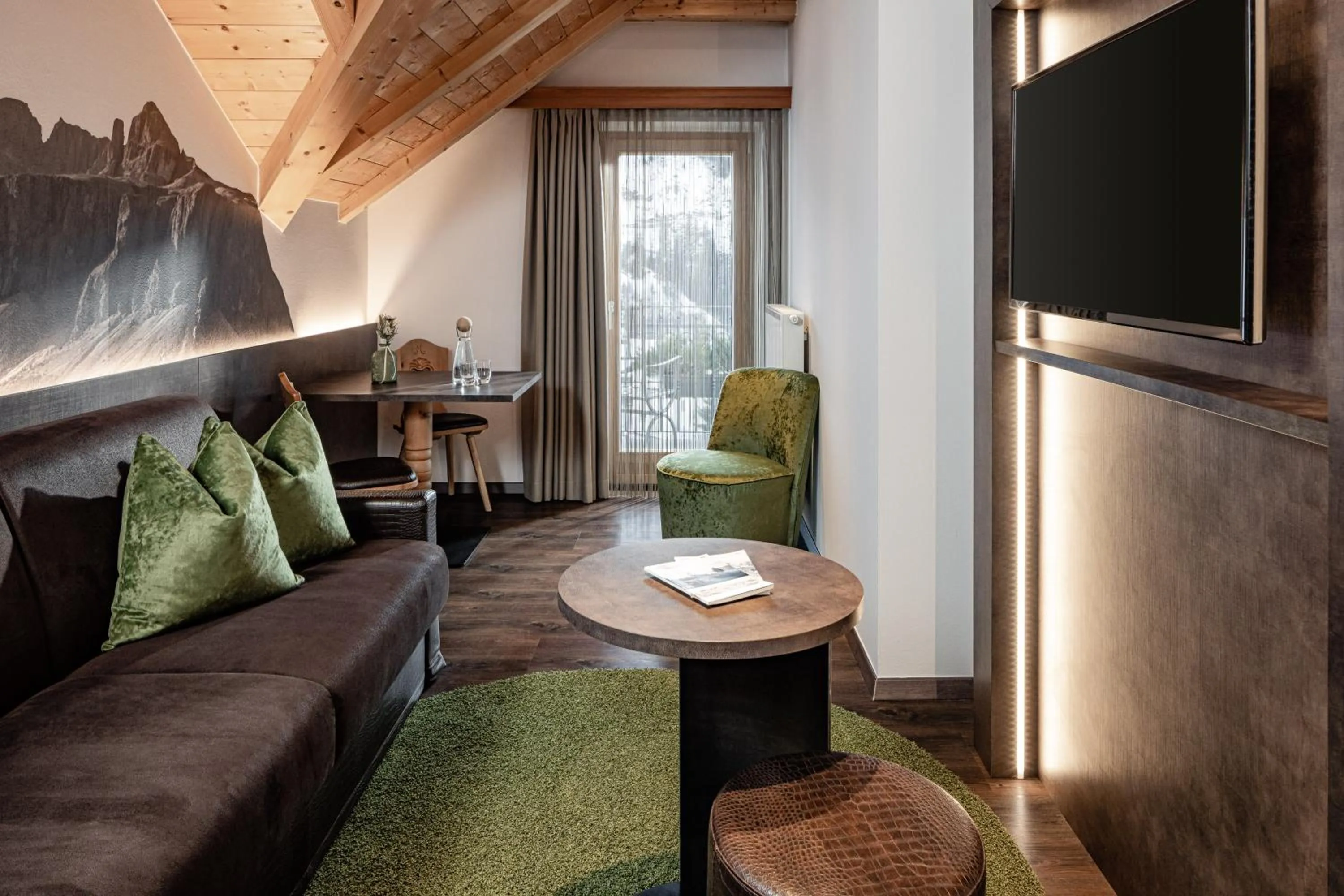 Seating area in Boutique & Fashion Hotel Maciaconi - Gardenahotels