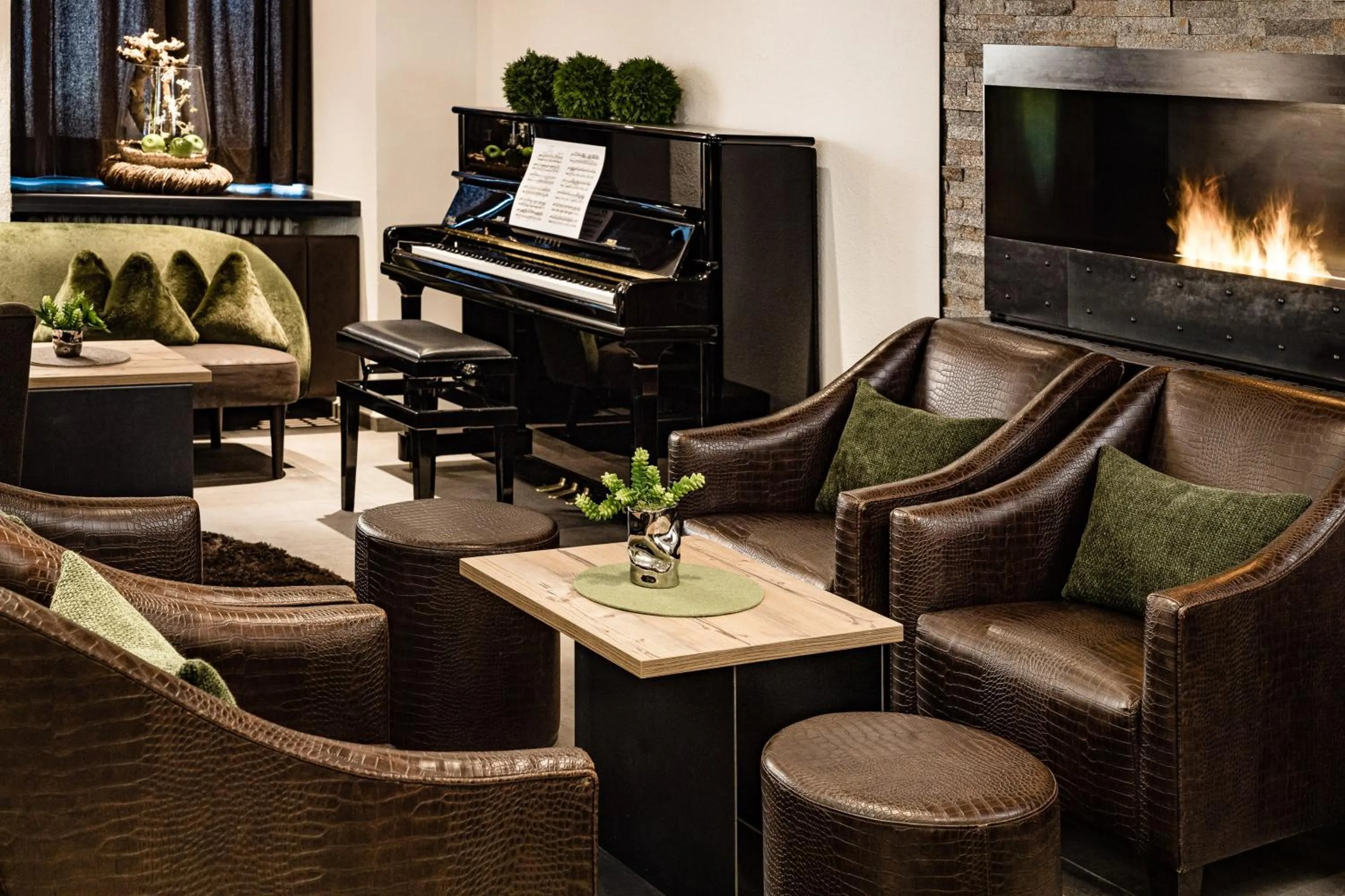 Communal lounge/ TV room in Boutique & Fashion Hotel Maciaconi - Gardenahotels