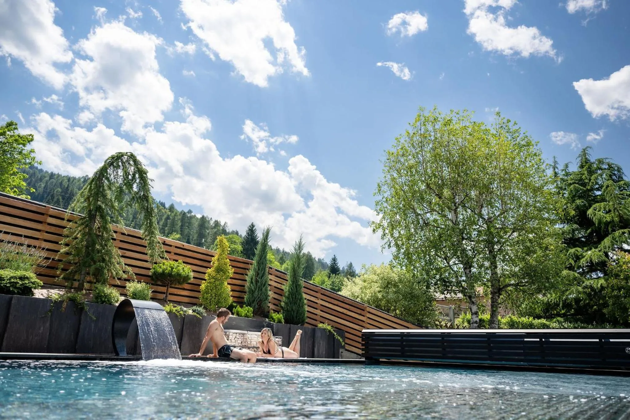 Swimming pool in Tevini Dolomites Charming Hotel